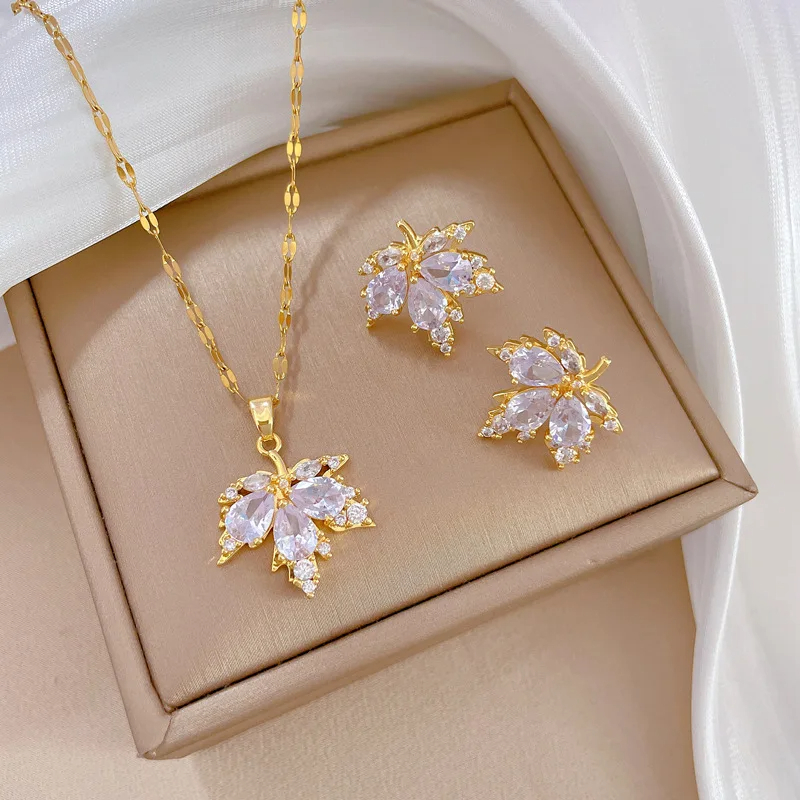 conjuntos de joyas bimba y lola bolsos artículos con envío Juego de pendientes de collar con microincrustaciones, aretes de moda, cadena de clavícula, temperamento de personalidad, hoja de arce de lujo ligero, banquete