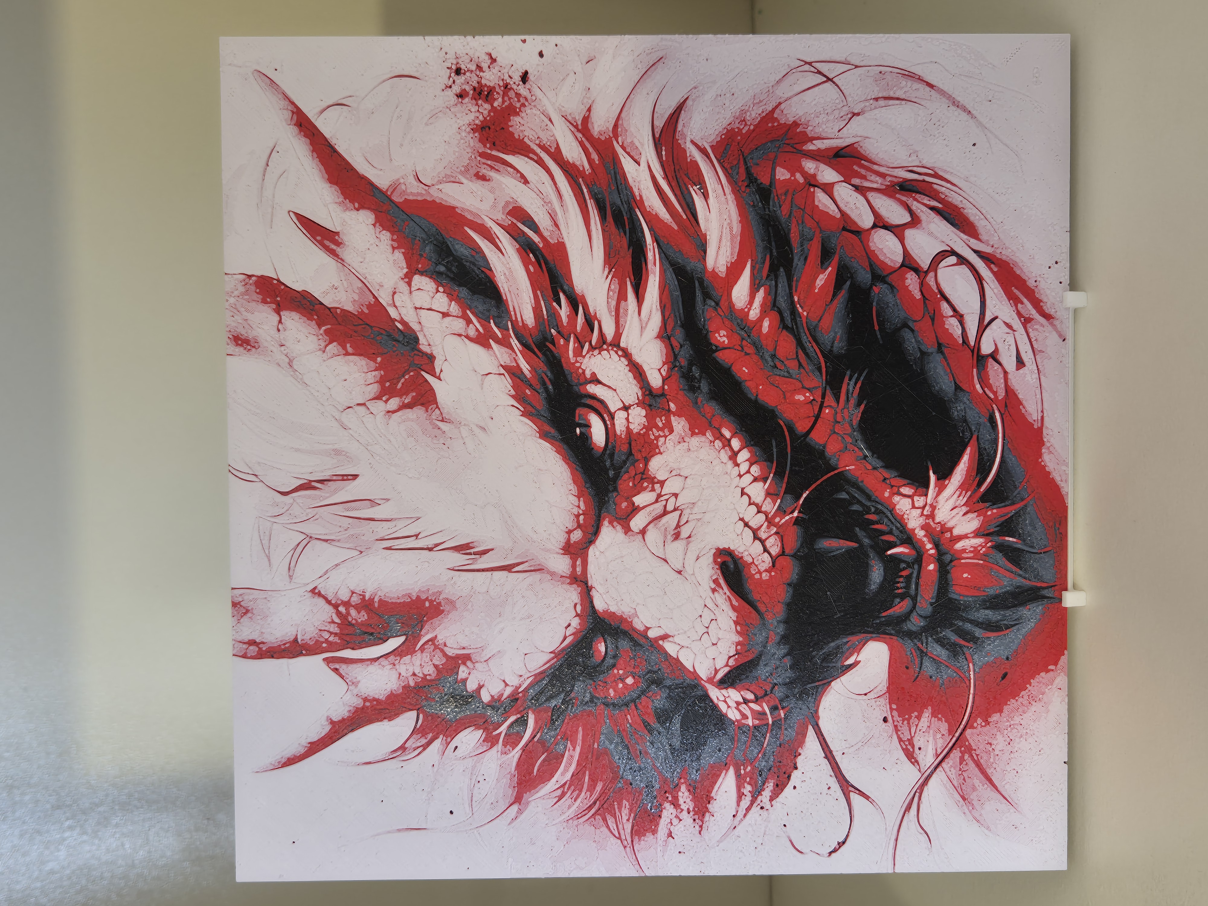 Tête de dragons aux yeux malicieux