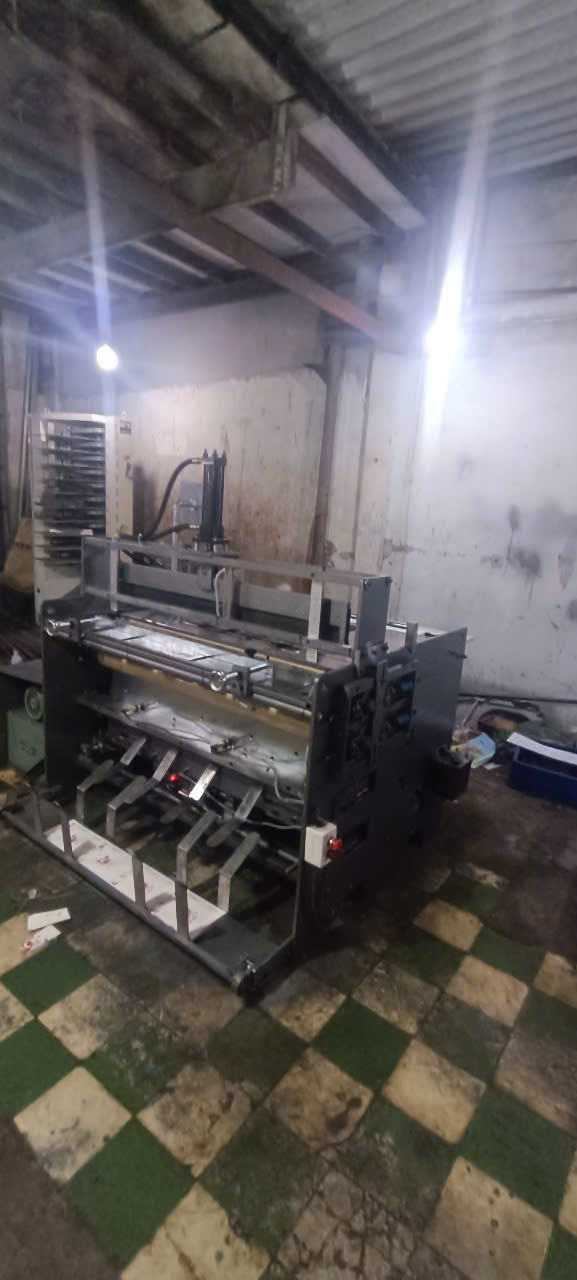 Máy gấp & lăn ép vuông gáy tập học sinh – Giải pháp hoàn thiện tập vở công nghiệp