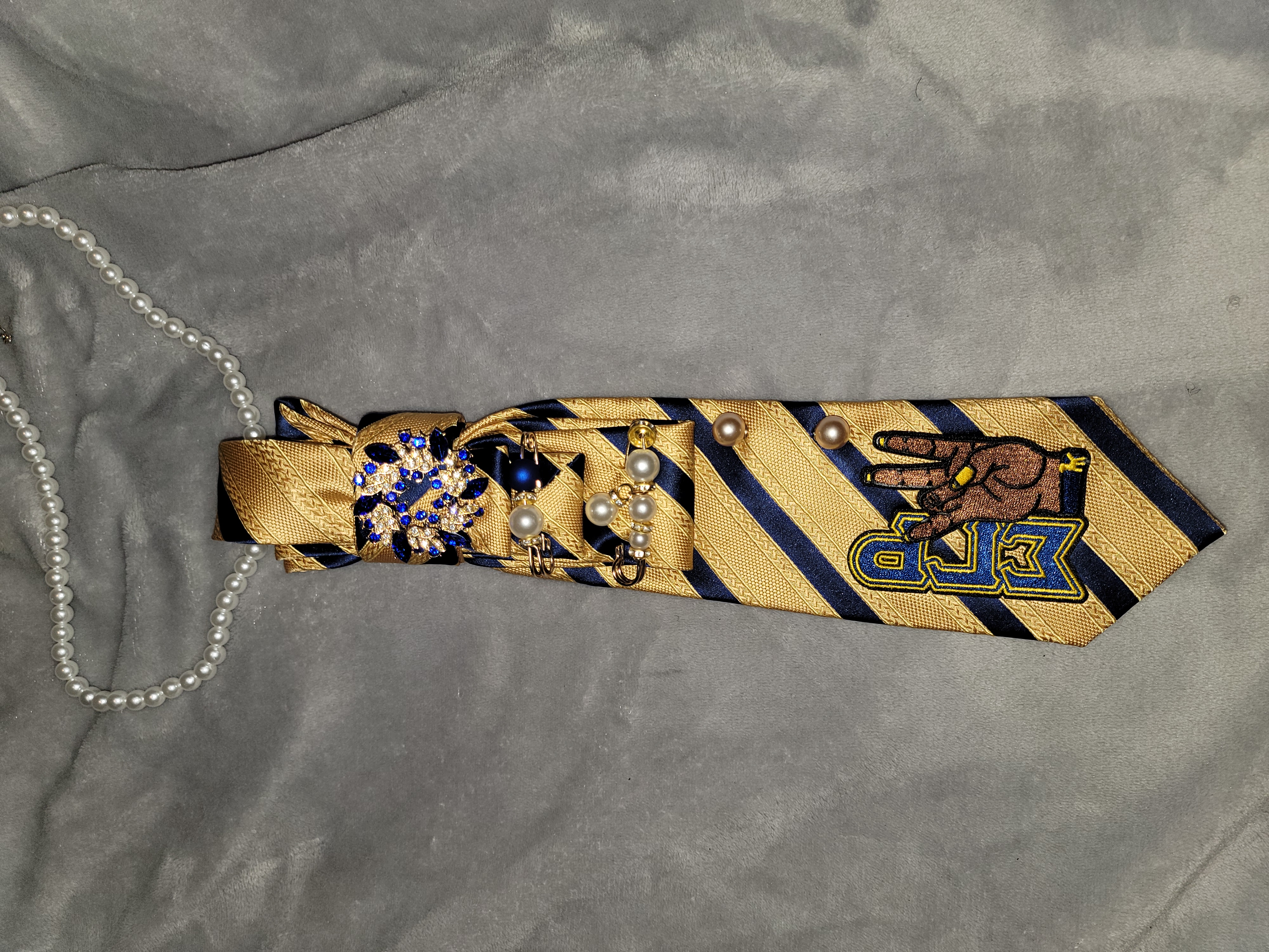 Sigma Gamma rho folded tie