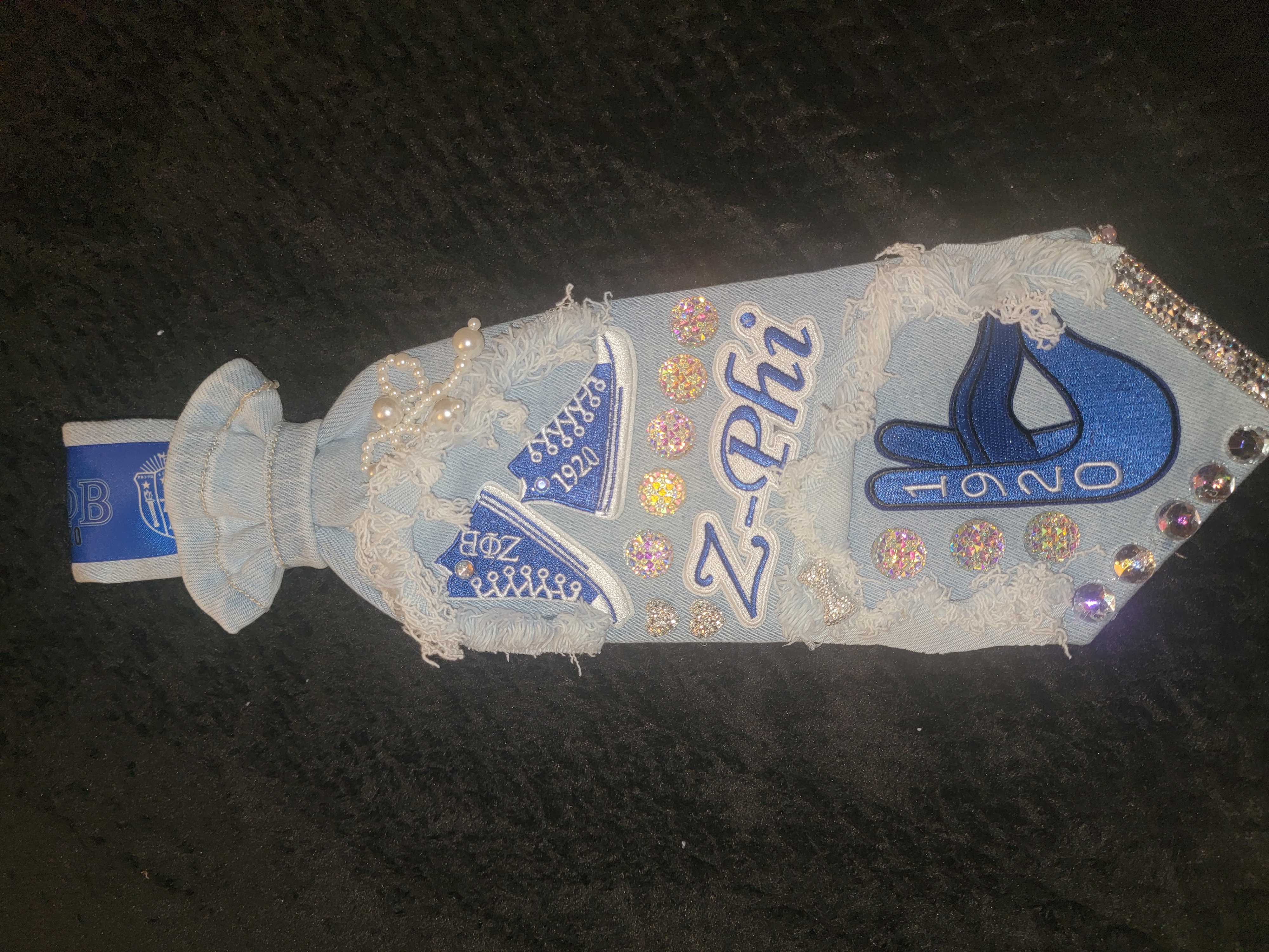 Zeta tie (blue sign) 