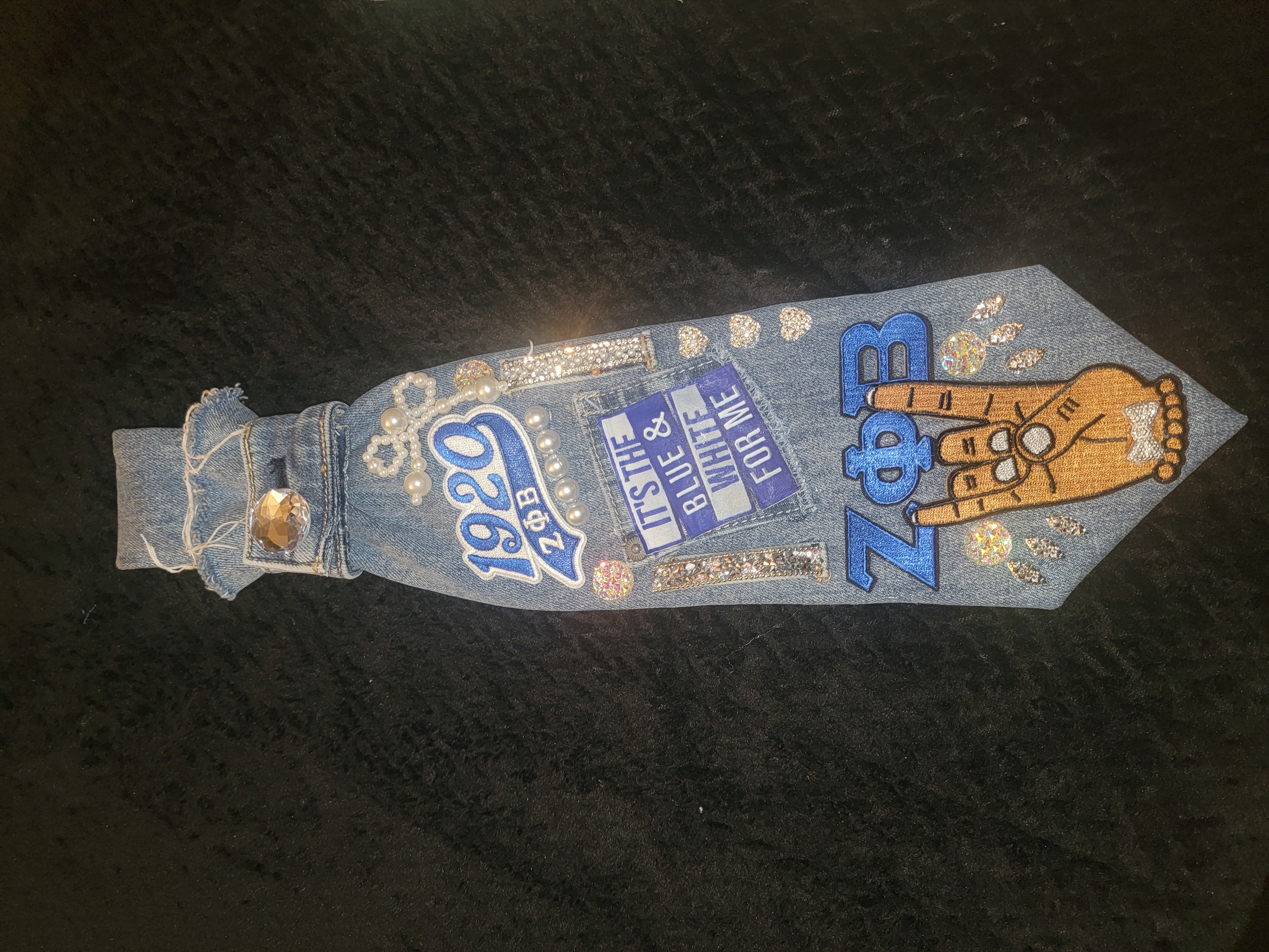 Zeta tie {hand} 