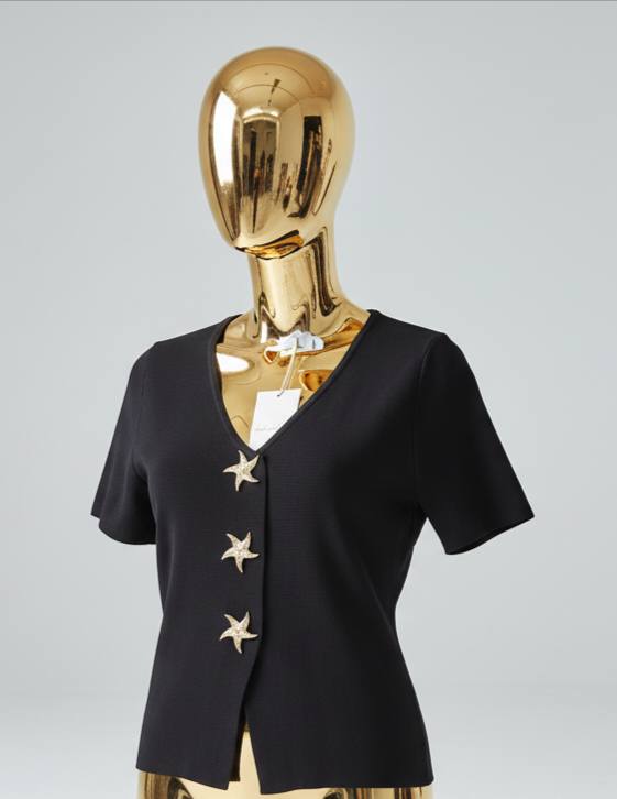 Blusa tejido con botones estrella