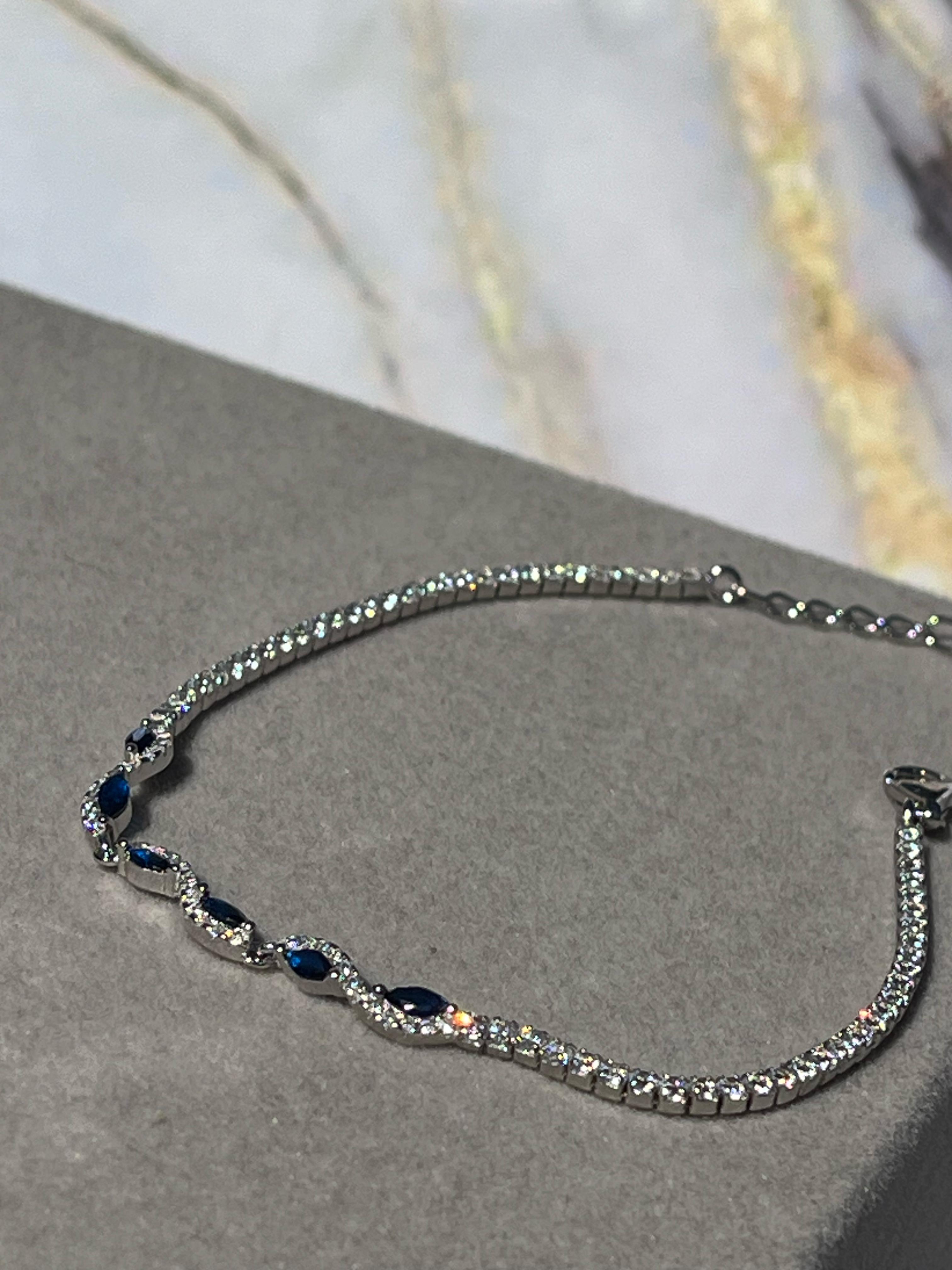 Pulsera tenis con rubis y zafiros