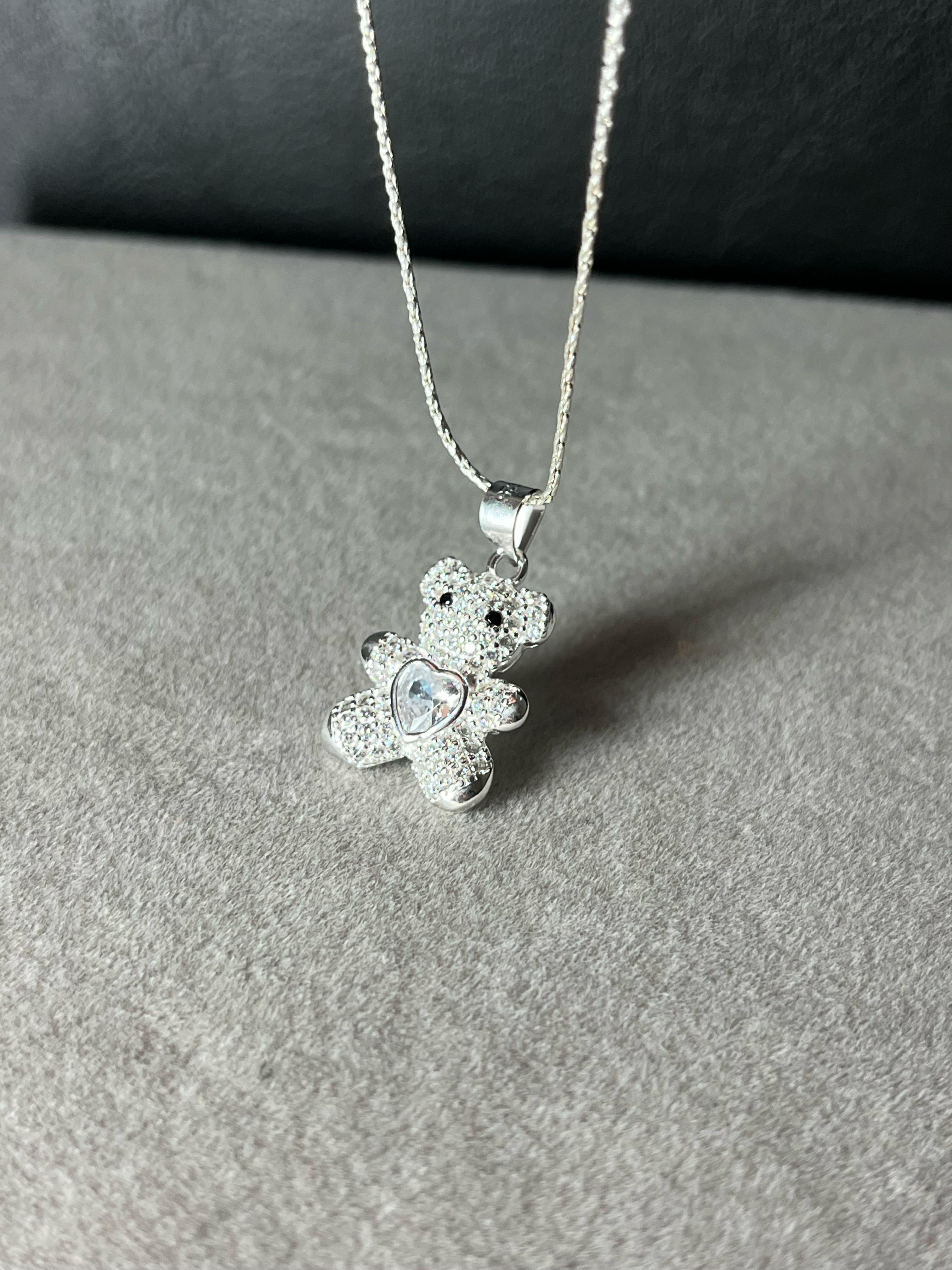 Dije osito con centro corazon de cubic