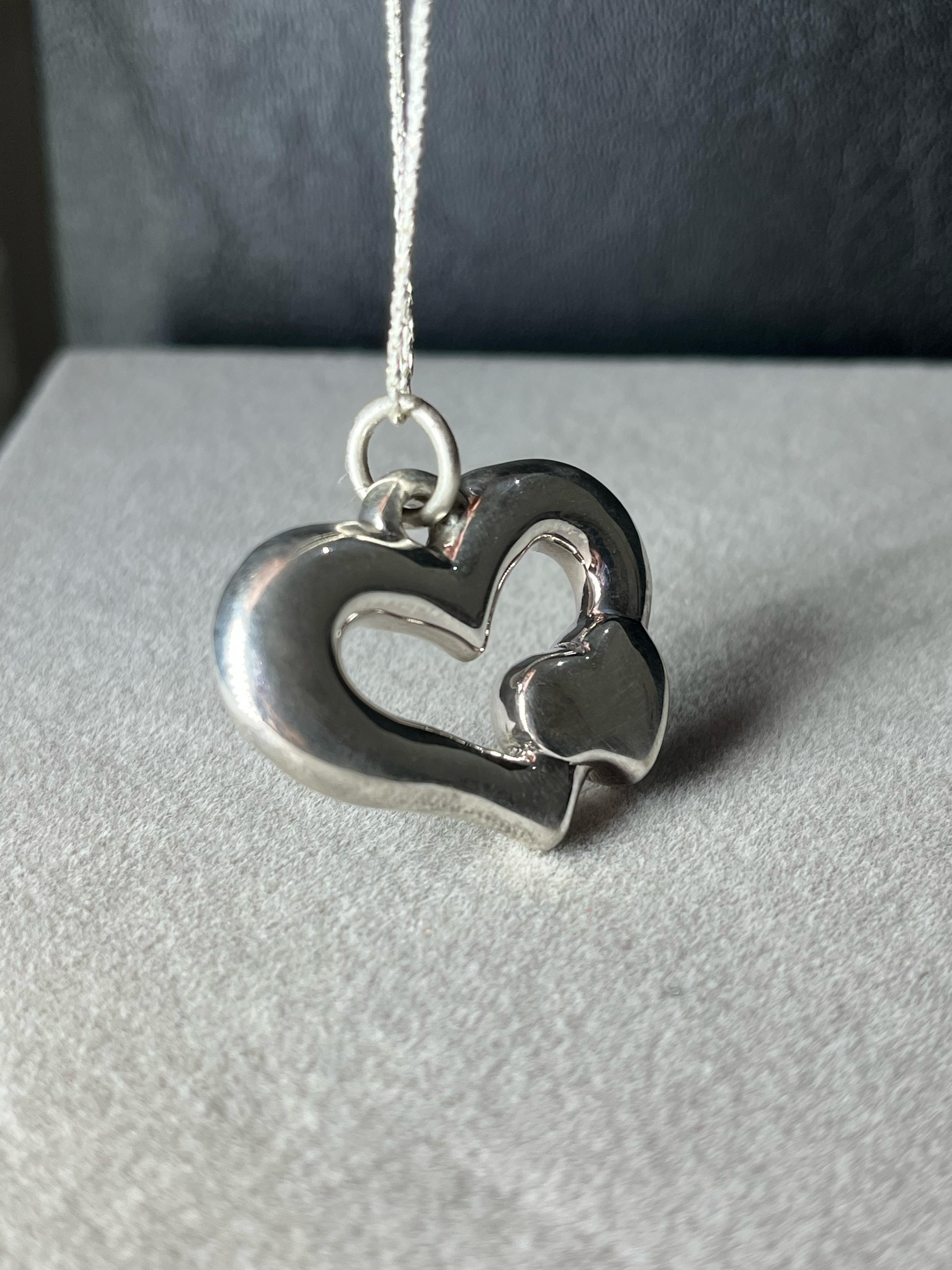 Dije corazon de plata inflada 