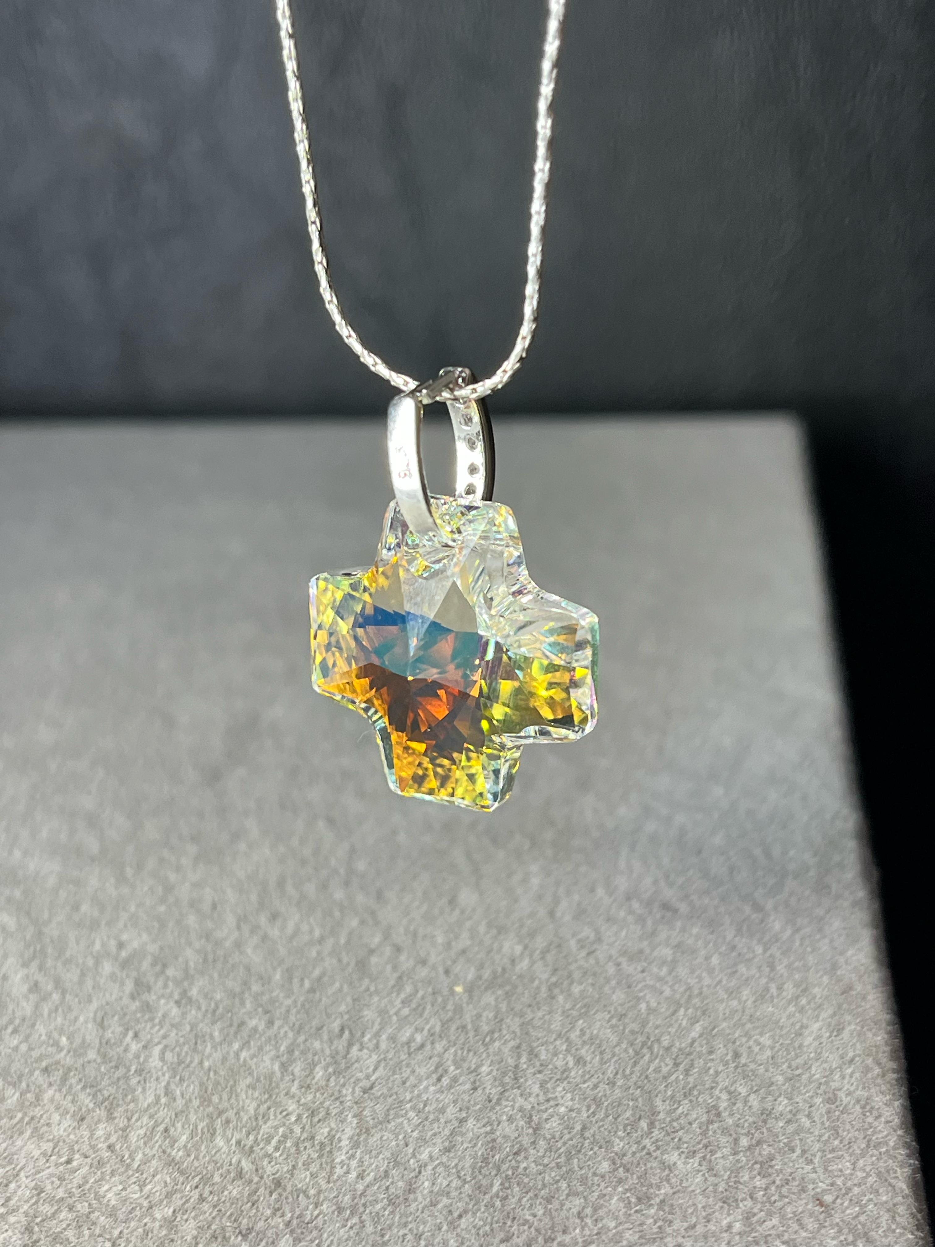 Dije cruz del equilibri en cristal de Swarousky