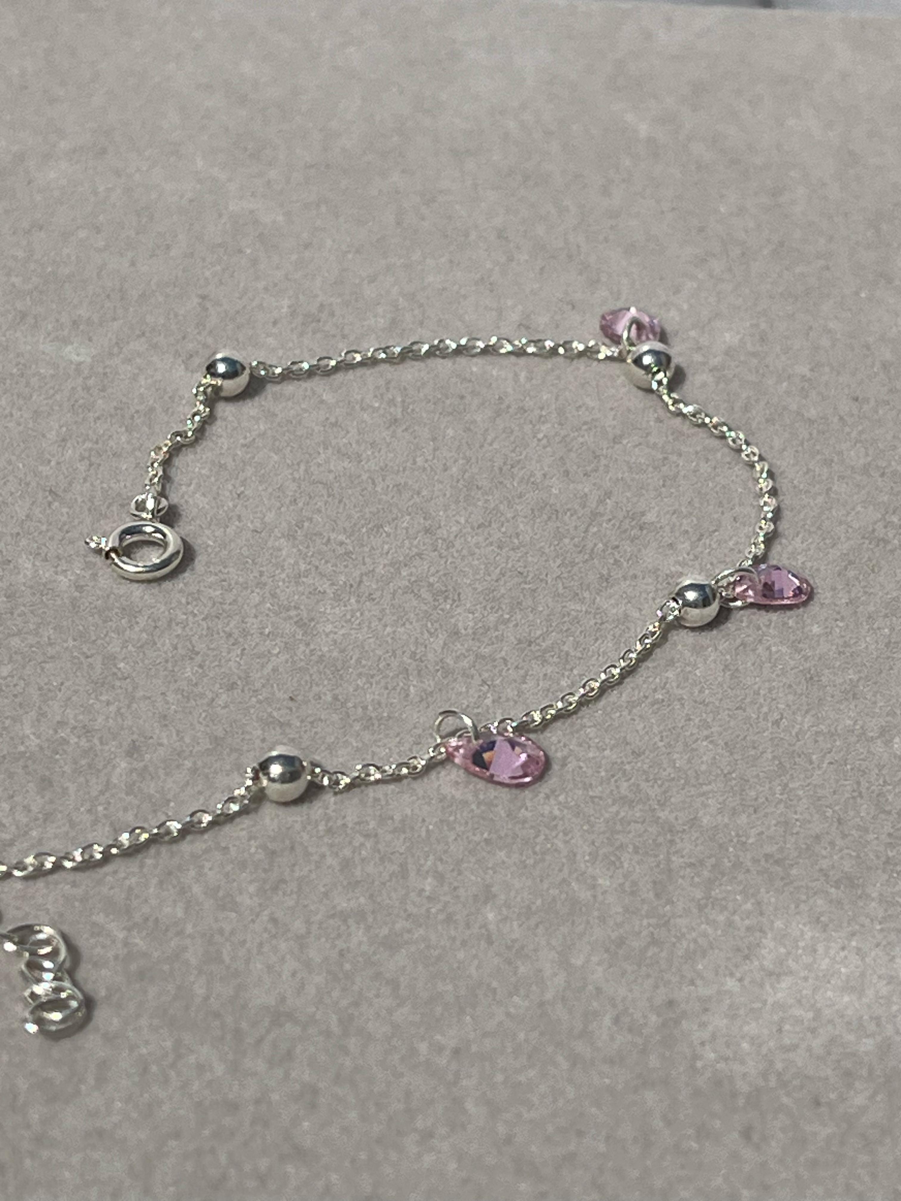 Pulsera con dijes cubic rosas