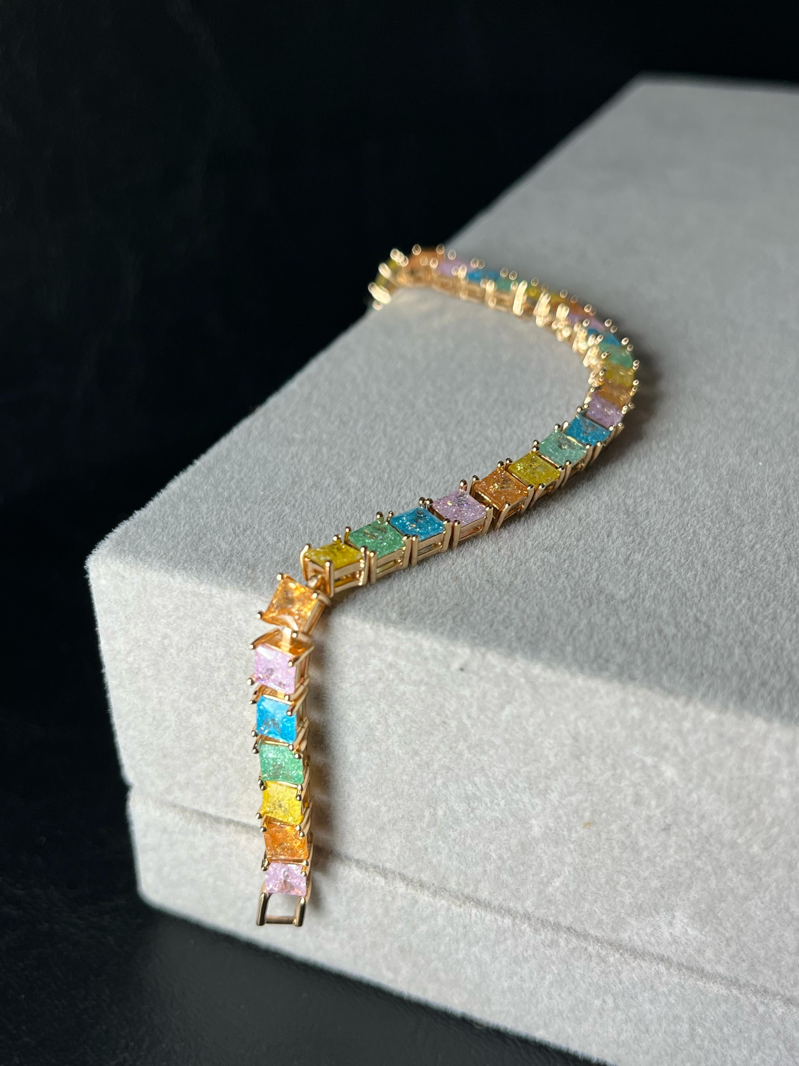 Pulsera fantasia dorada multicolor 