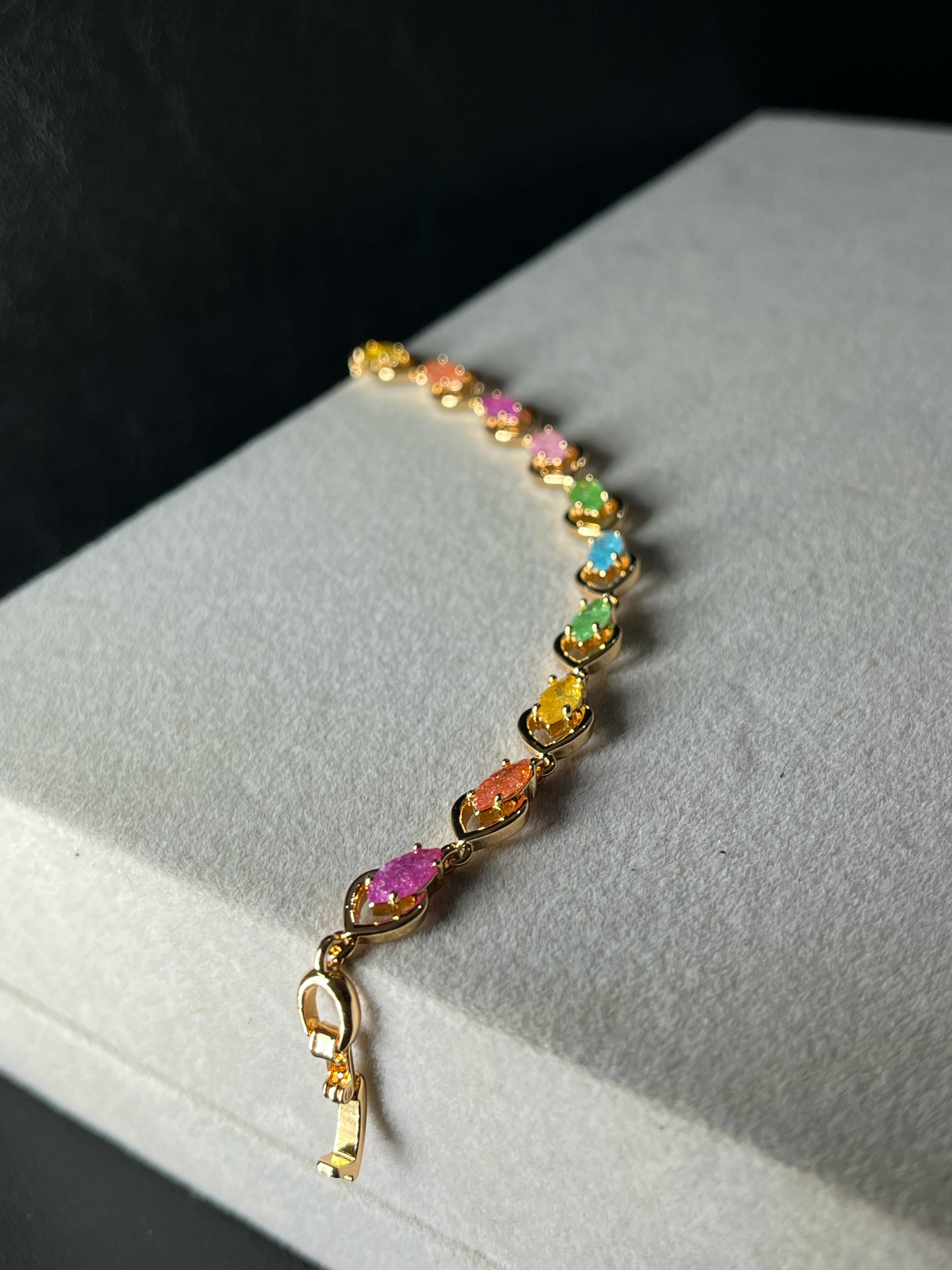 Pulsera fantasia dorada multicolor 