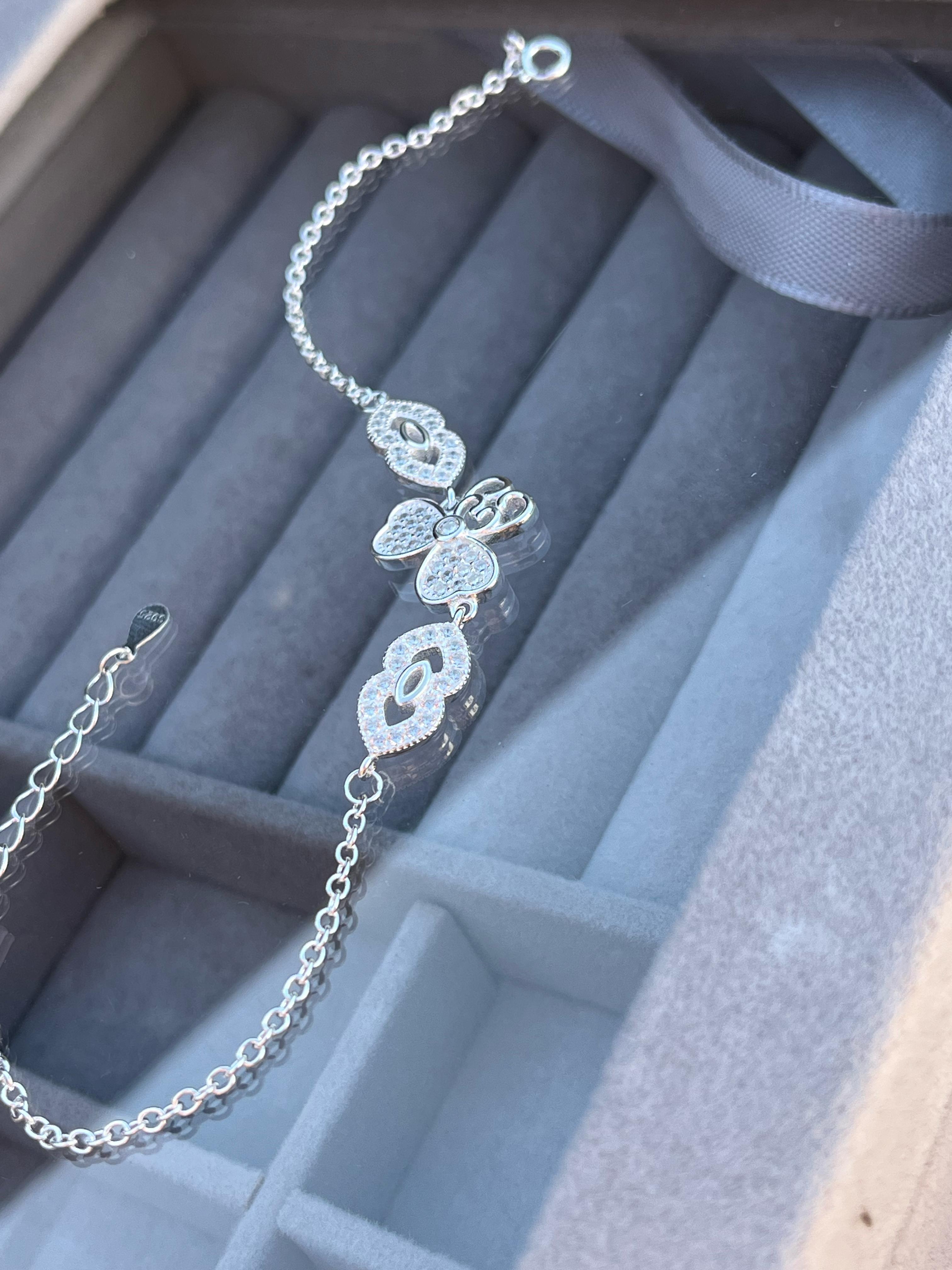 Pulsera tenis con dije trebol de cuatro hojas