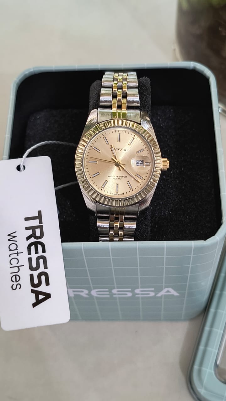 Reloj Tressa malla de acero plateado y dorado