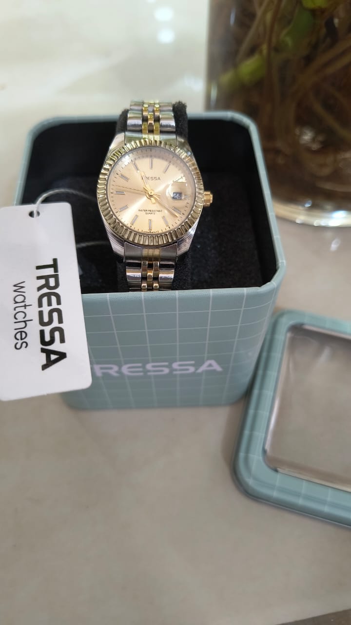 Reloj Tressa malla de acero plateado y dorado