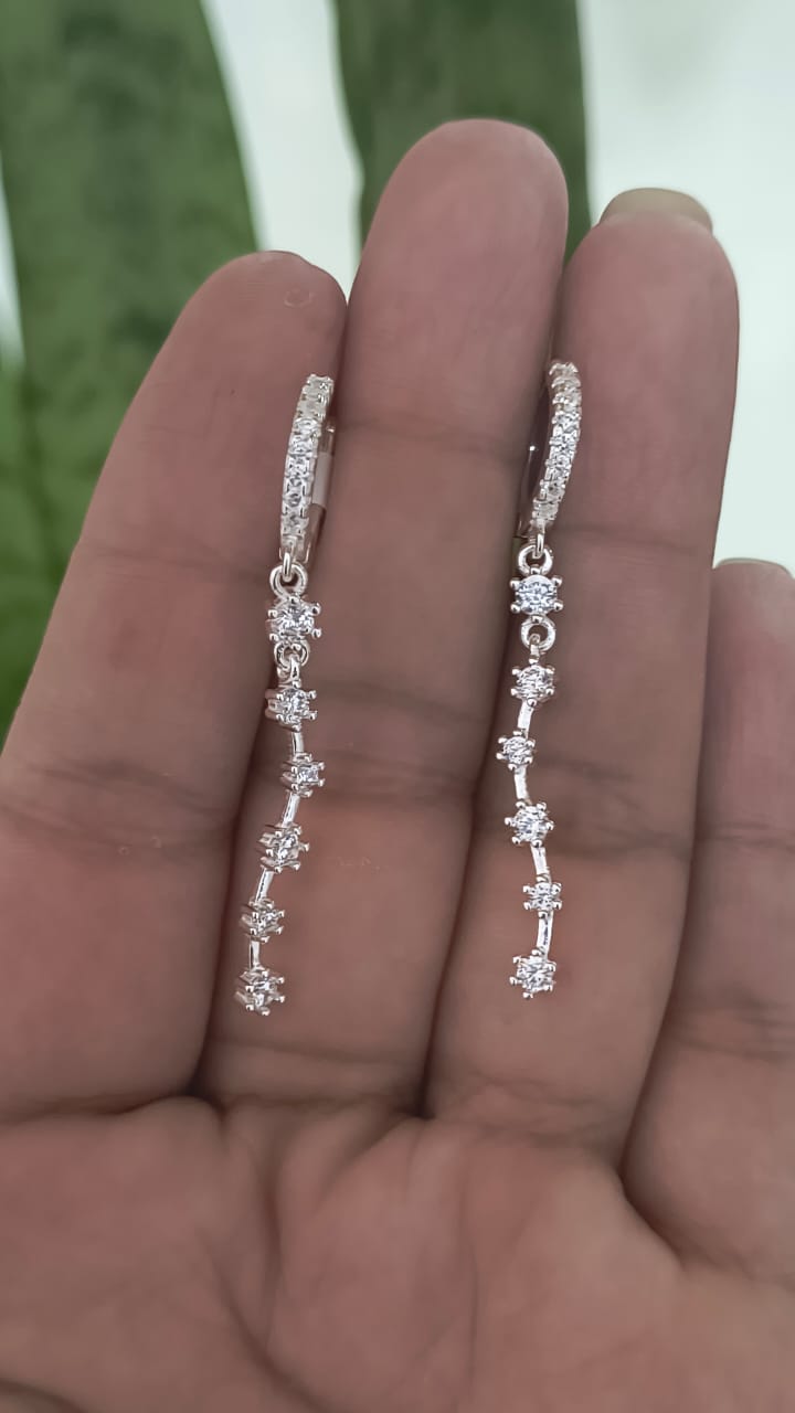 Argollitas con estrellitas colgando