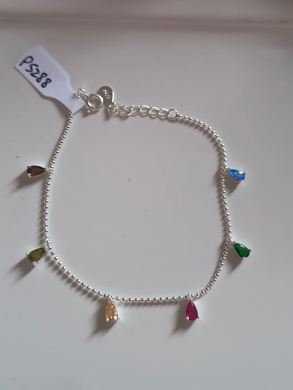 Pulsera de plata con dijes cubic multicolor 