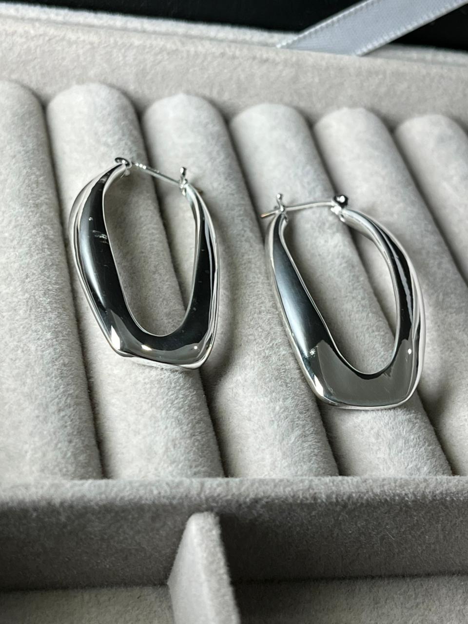 Aros rectangulares de plata inflada