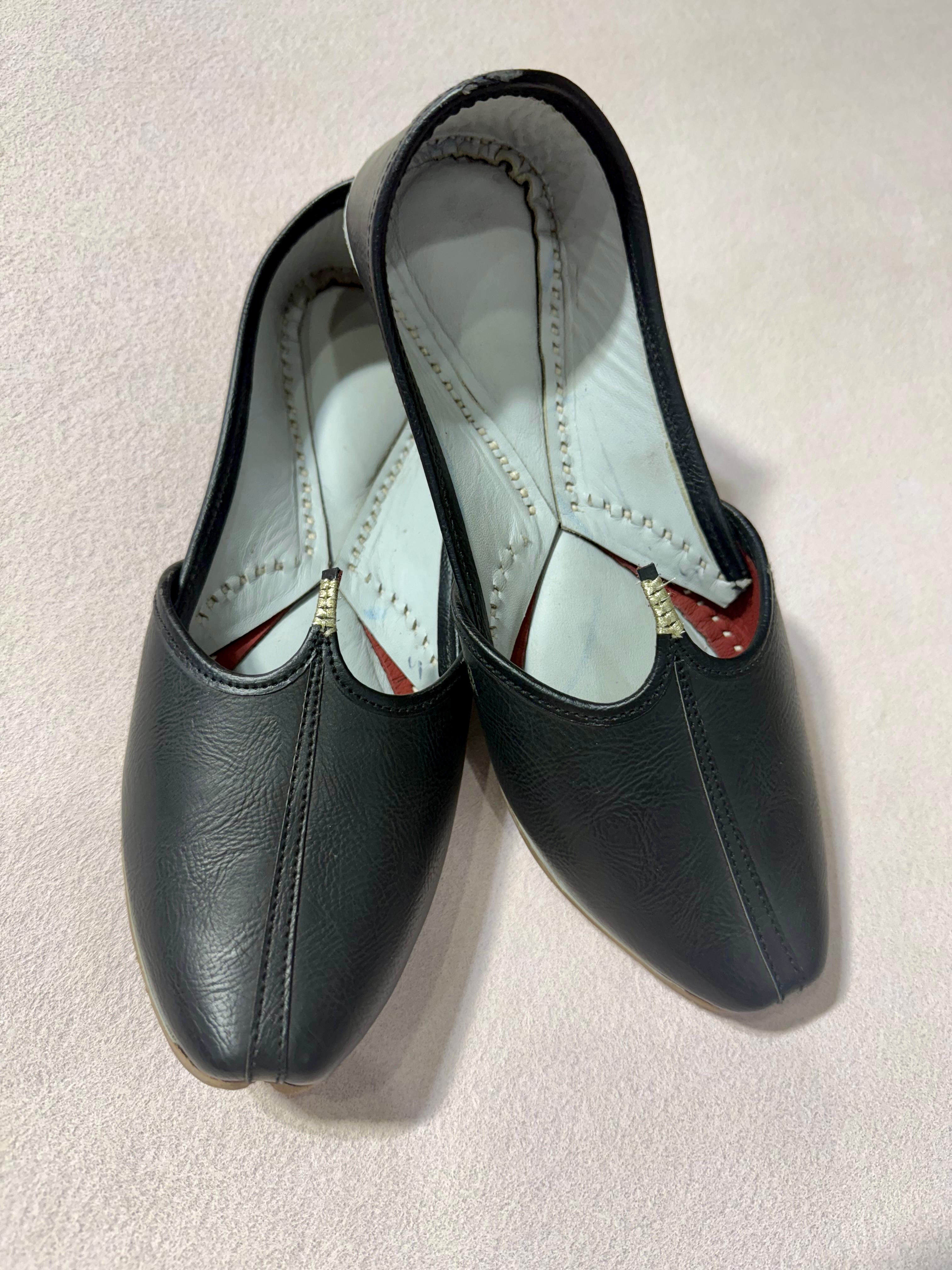 Black leather loafers