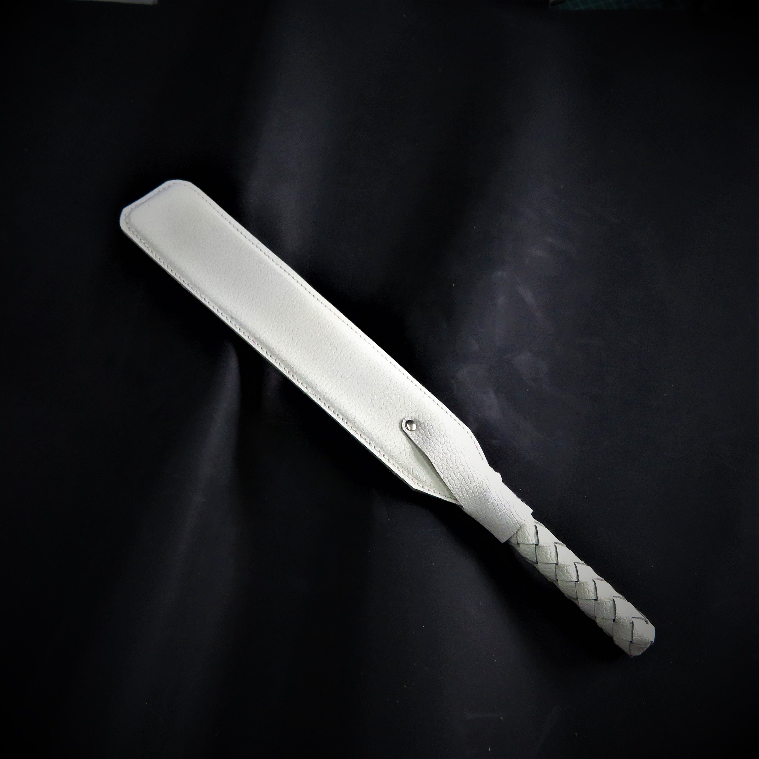 White Leather Spanking Paddle – Stylish & Sturdy Impact Toy