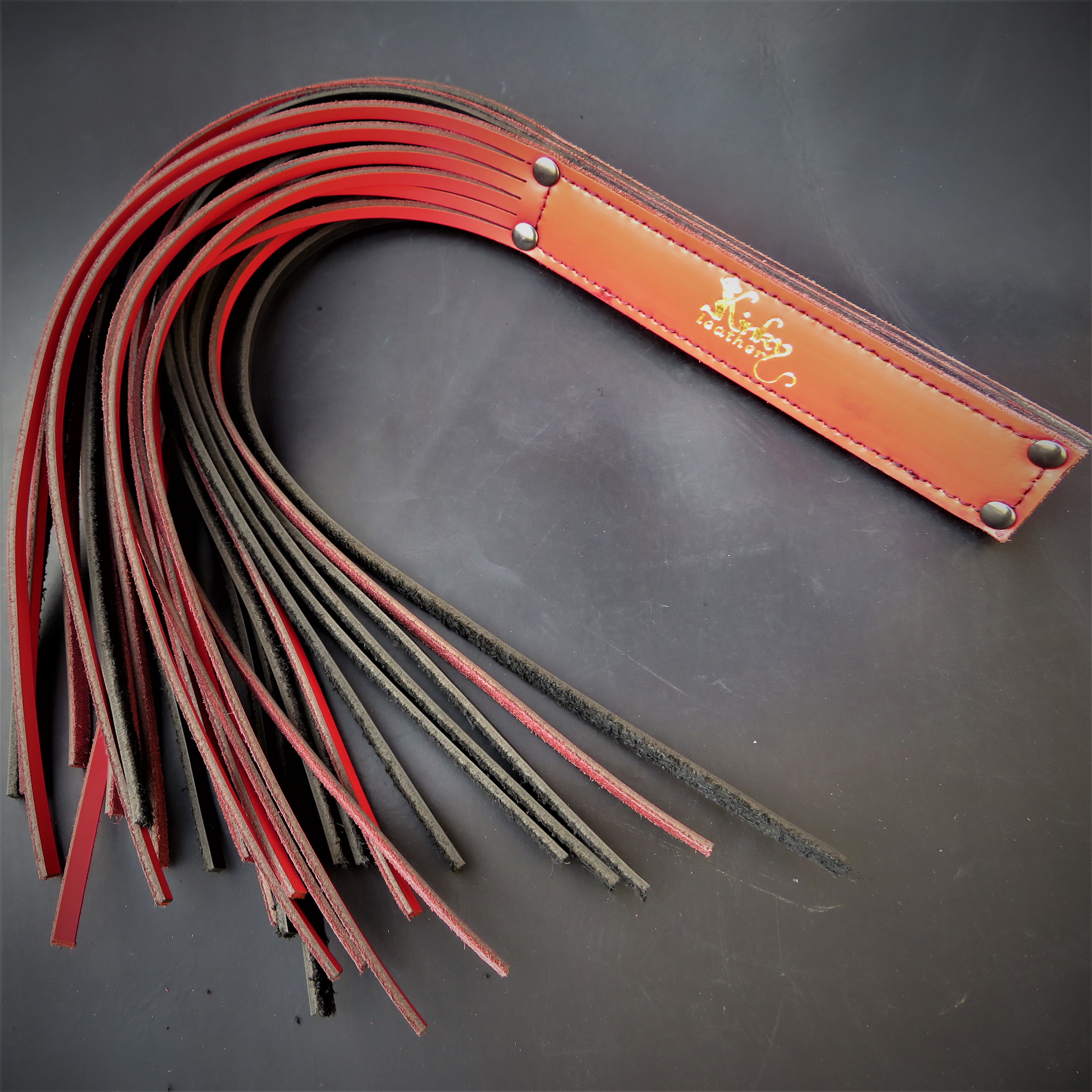 Handcrafted Black & Red Leather Flogger – Premium BDSM Accessory