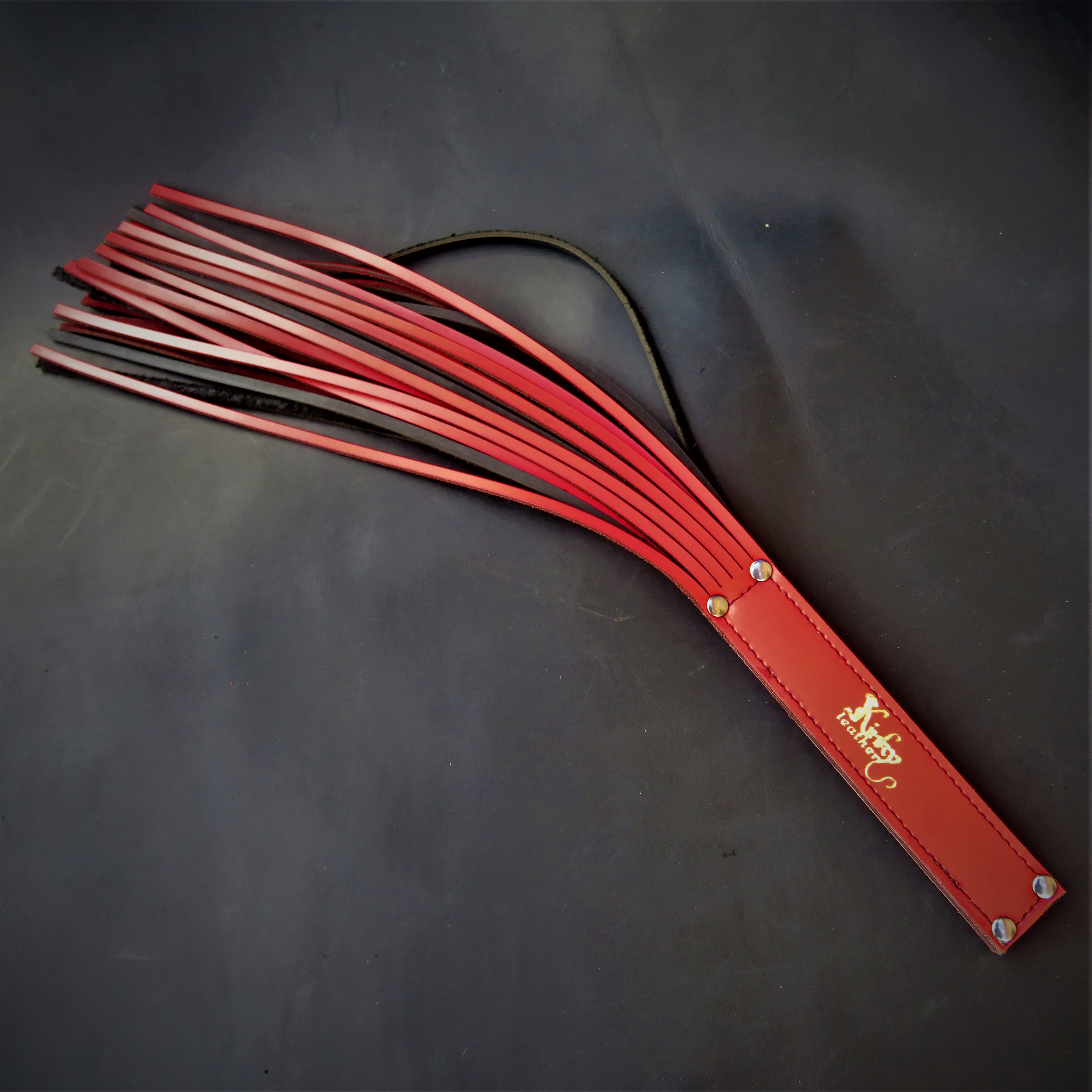 Handcrafted Black & Red Leather Flogger – Premium BDSM Accessory