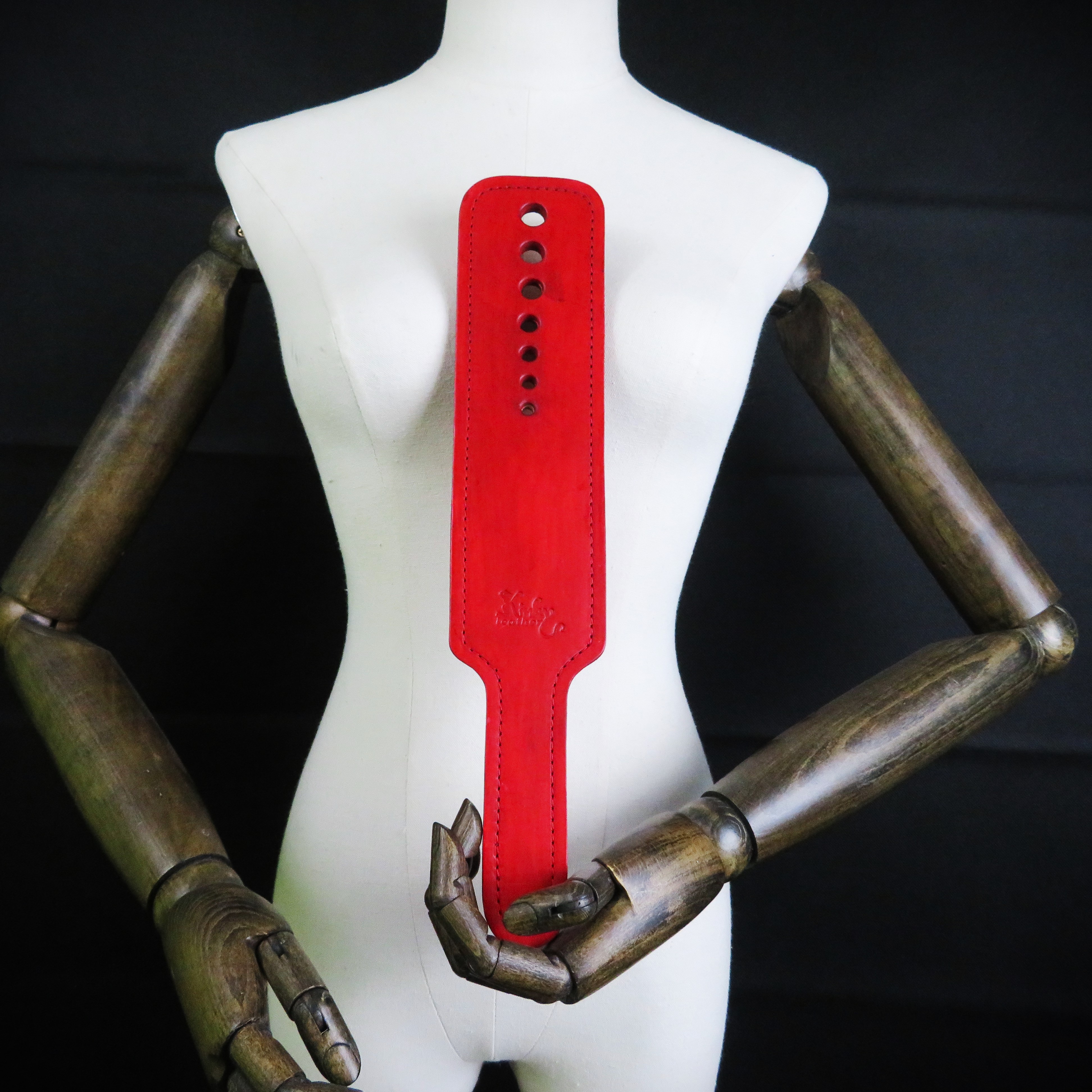 Handmade Red Leather Spanking Paddle – Craftsmanship, Elegance & Sensual Intensity