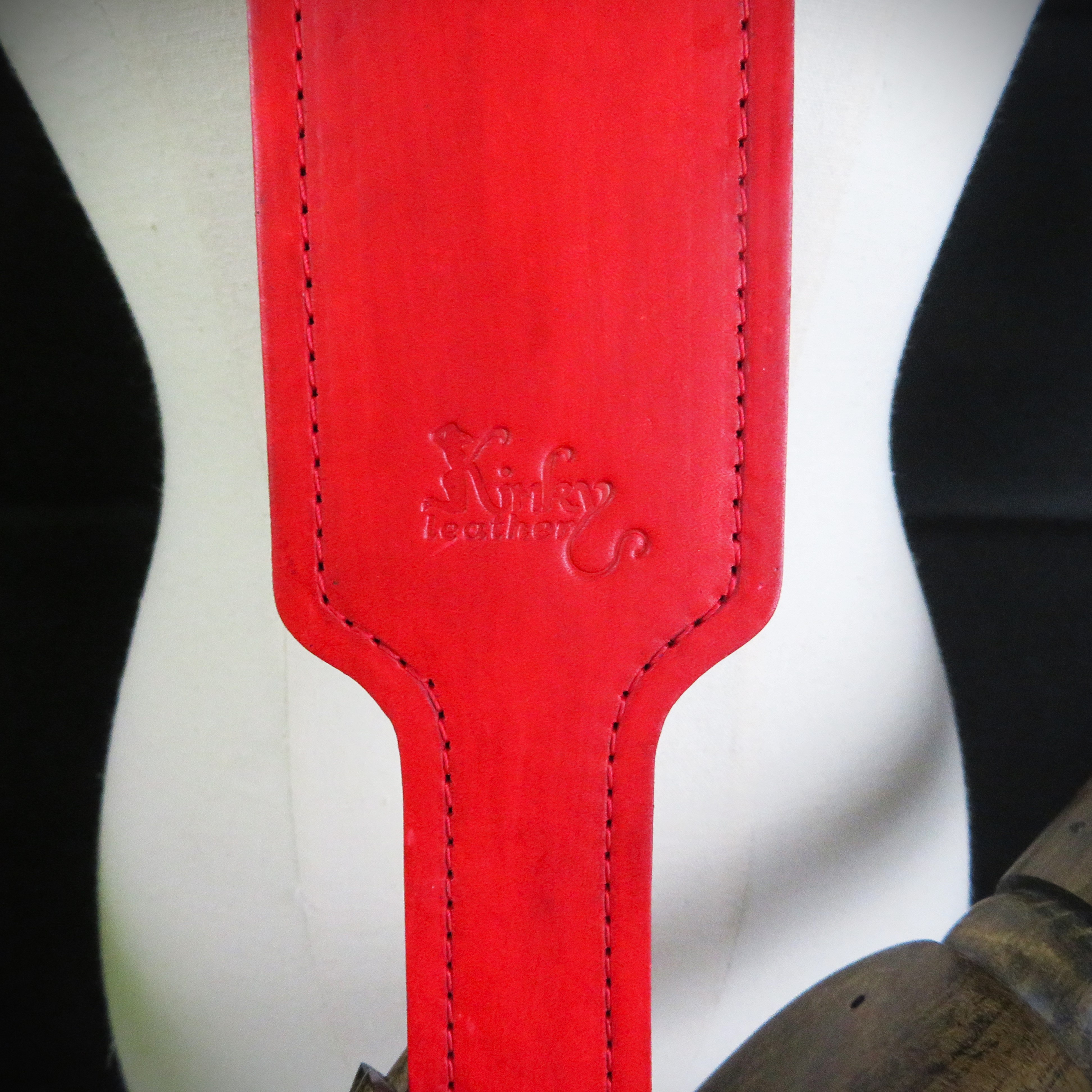 Handmade Red Leather Spanking Paddle – Craftsmanship, Elegance & Sensual Intensity
