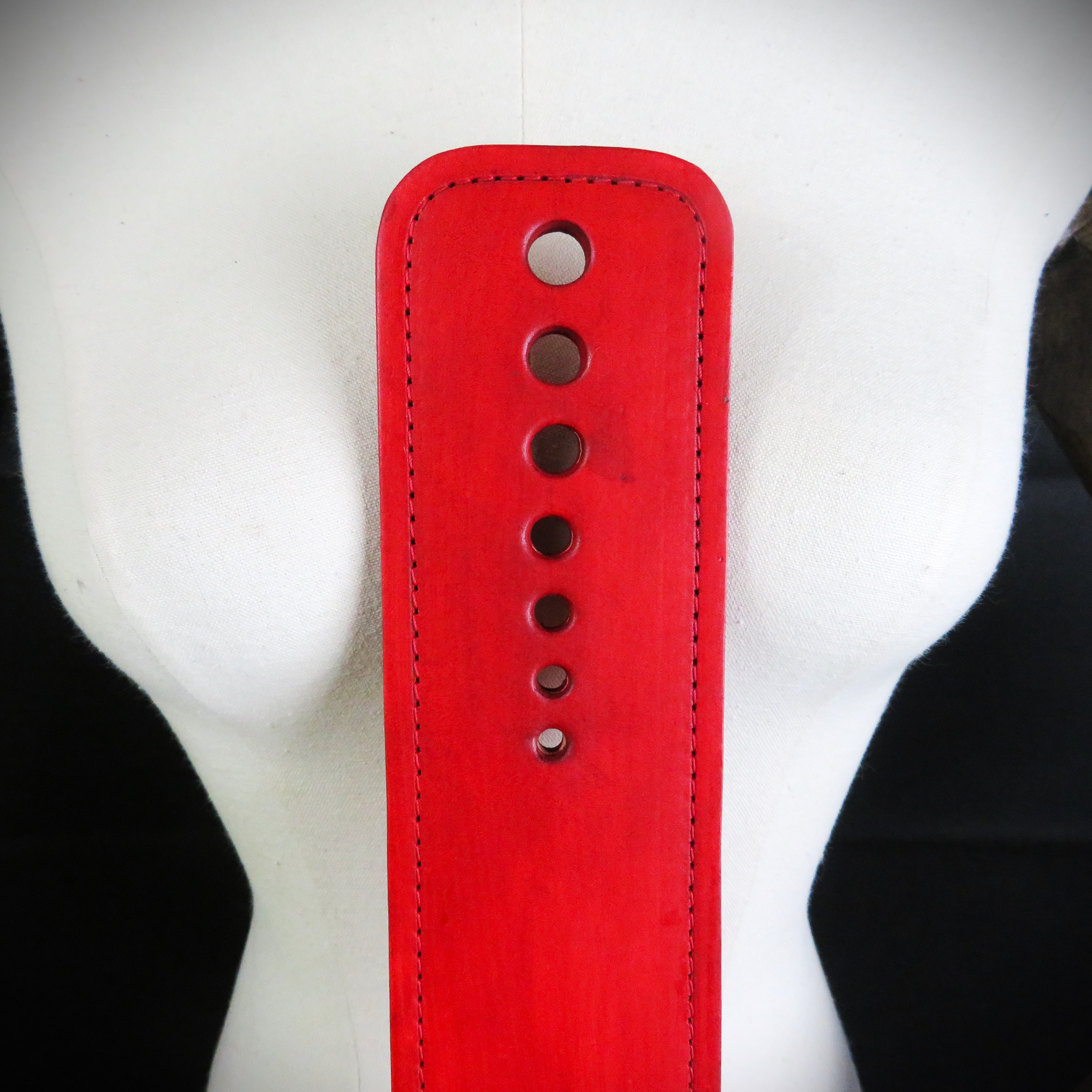 Handmade Red Leather Spanking Paddle – Craftsmanship, Elegance & Sensual Intensity