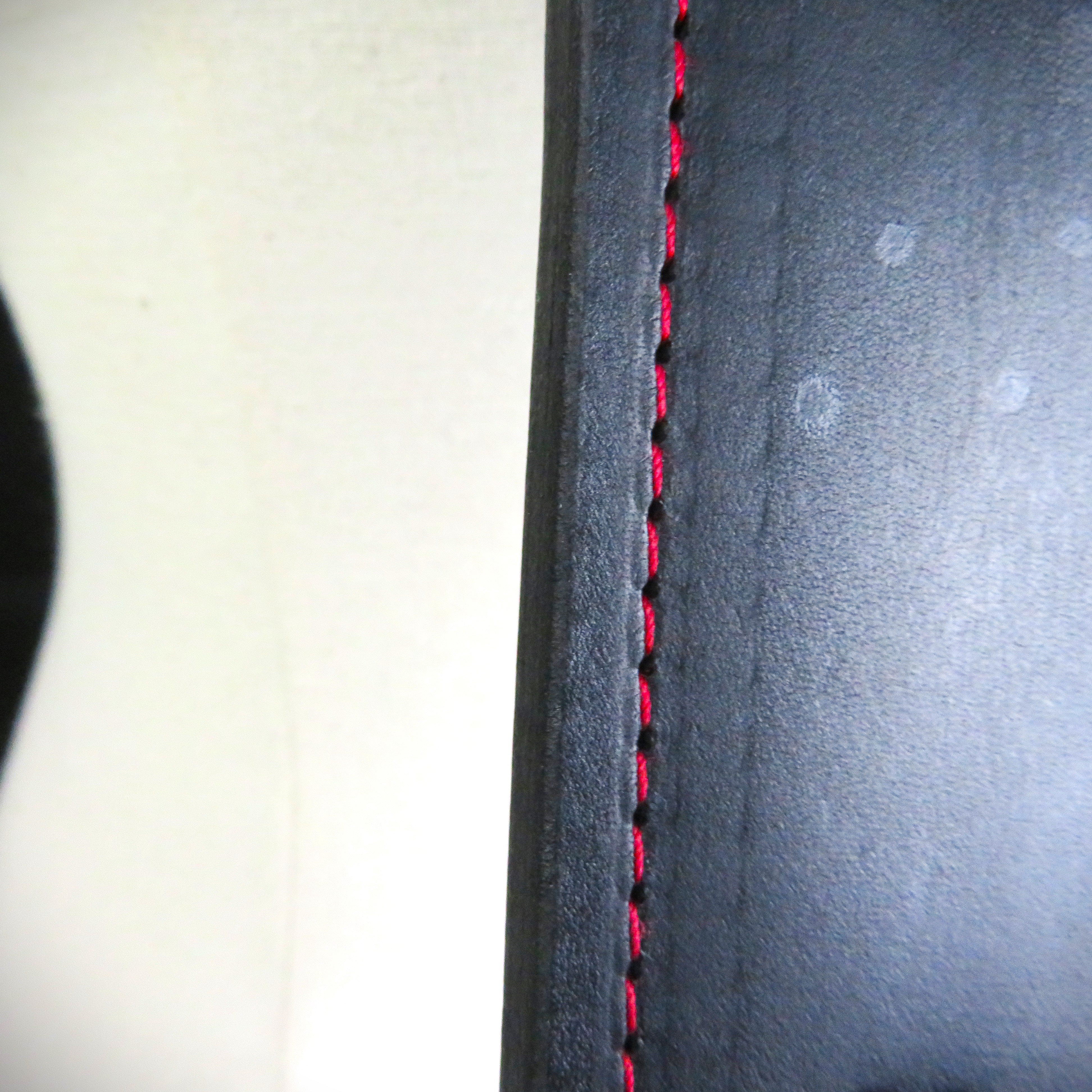 Handcrafted Black Leather Spanking Paddle with Bold Red Stitching