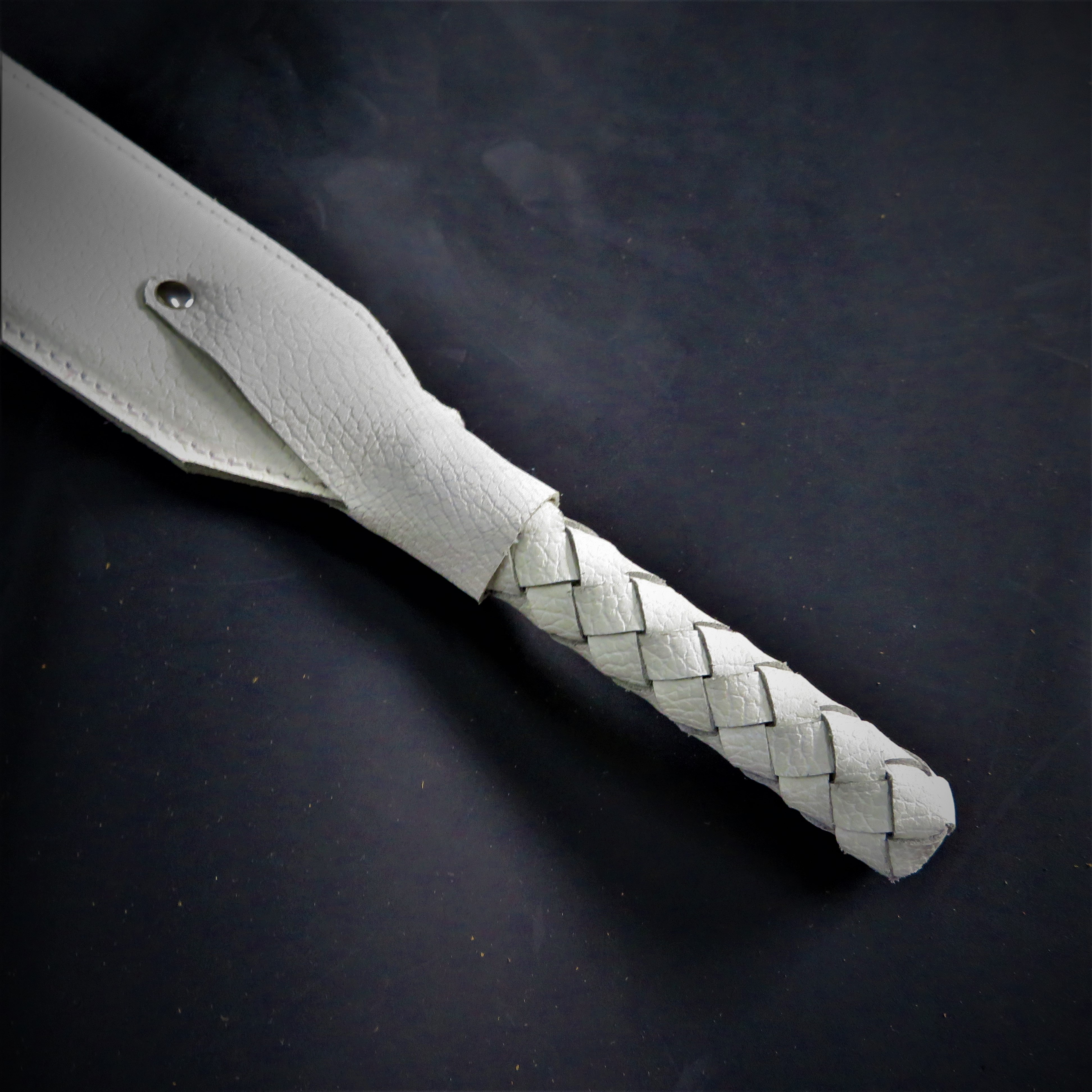 White Leather Spanking Paddle – Stylish & Sturdy Impact Toy