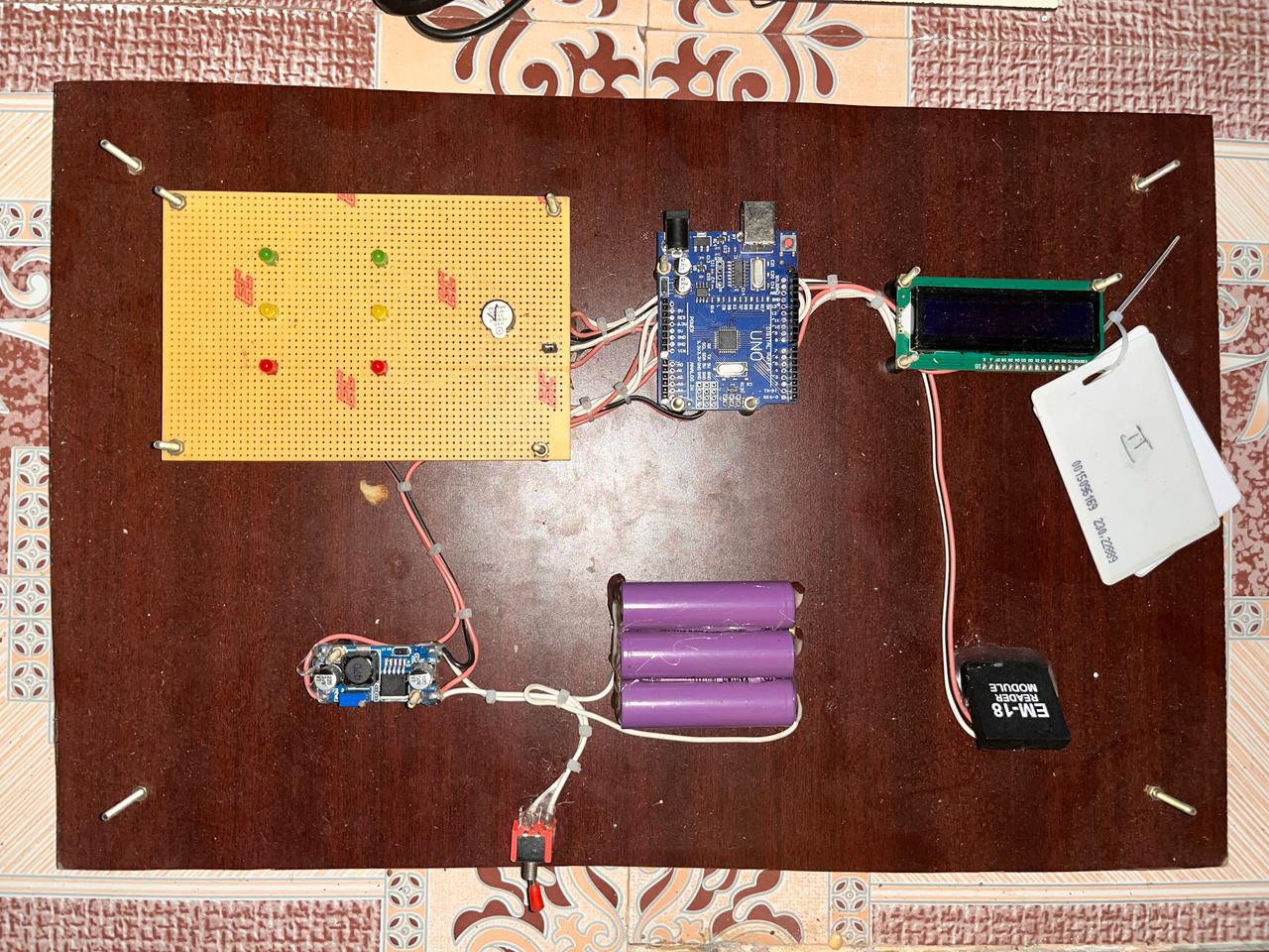 AmbuClear: RFID-Based Traffic Signal Control System for Ambulance Priority