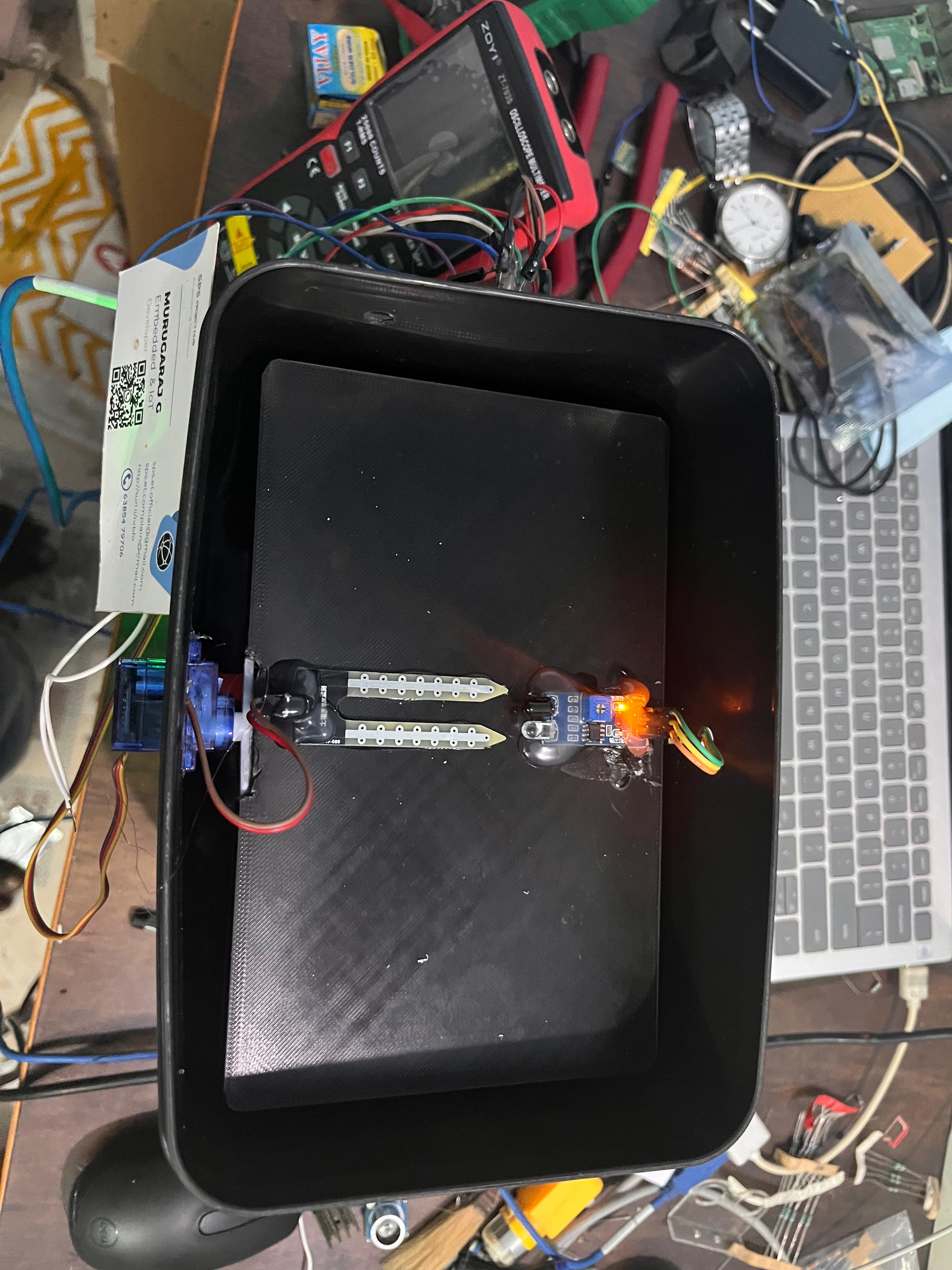 Smart Dustbin System Using IR and Wet Sensors with Servo Motor Control