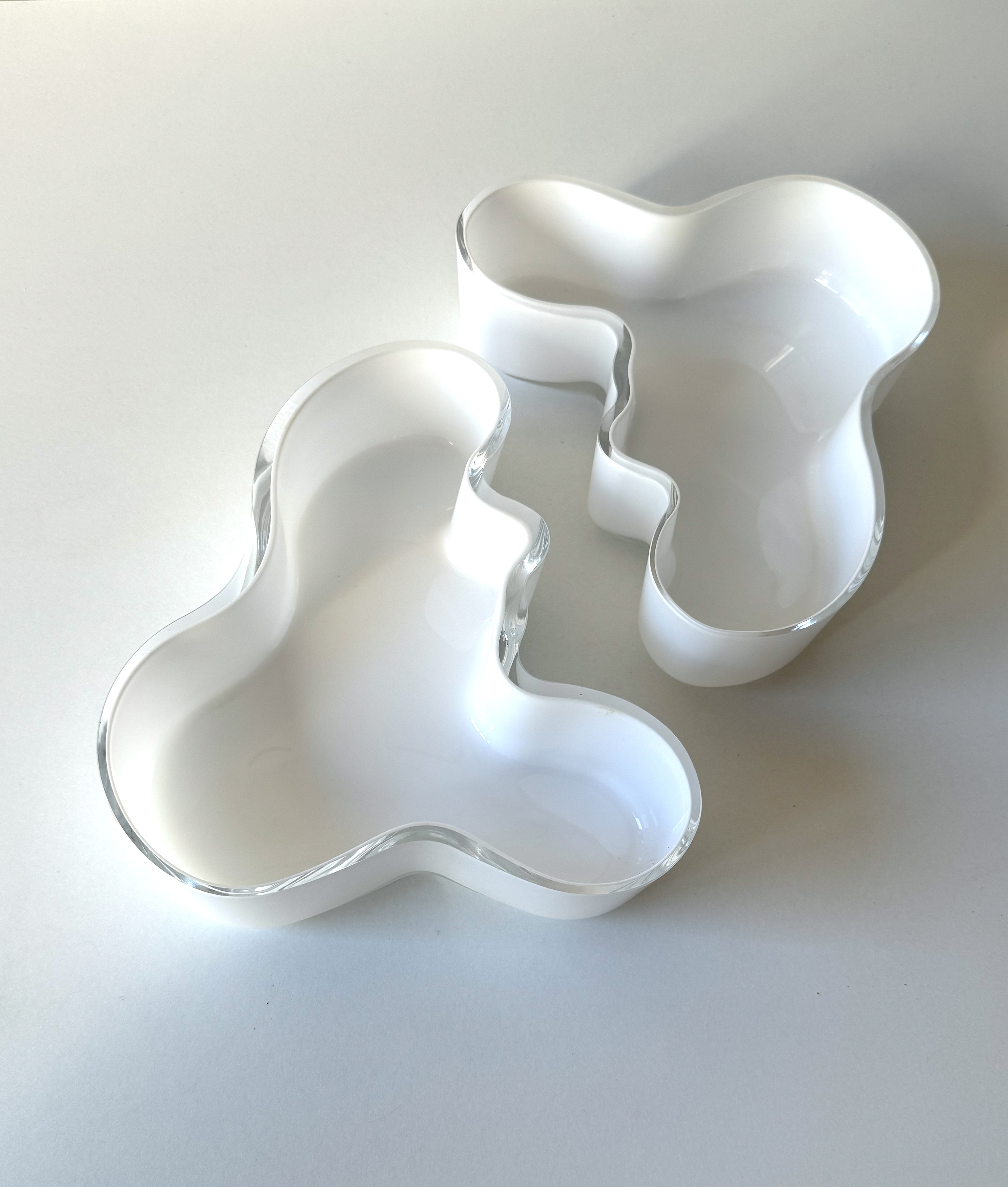 Glass bowls by Finnish company Iittala, design by Alvar Aalto  