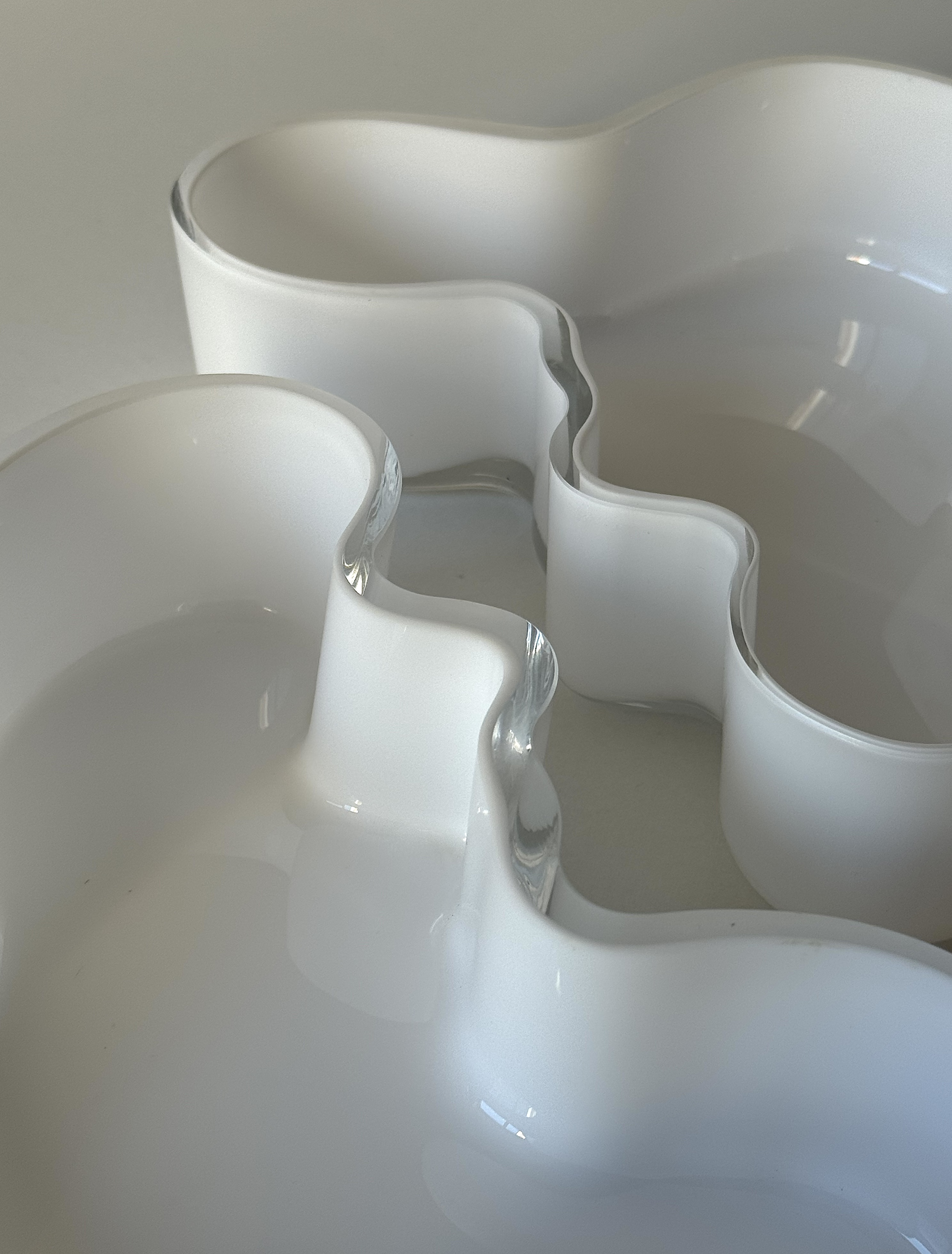Glass bowls by Finnish company Iittala, design by Alvar Aalto  