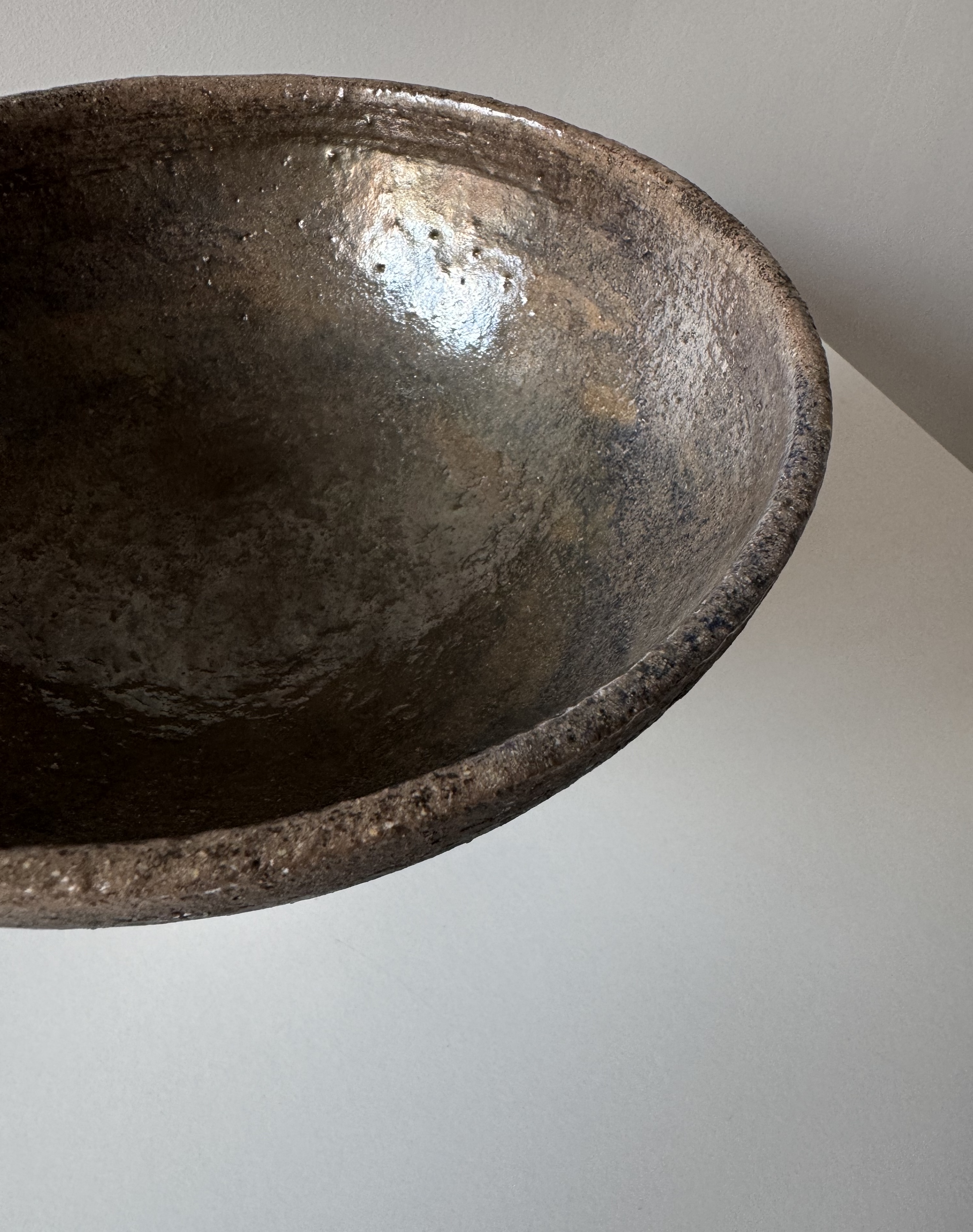 Handmade ceramic dish for fruits with a signature