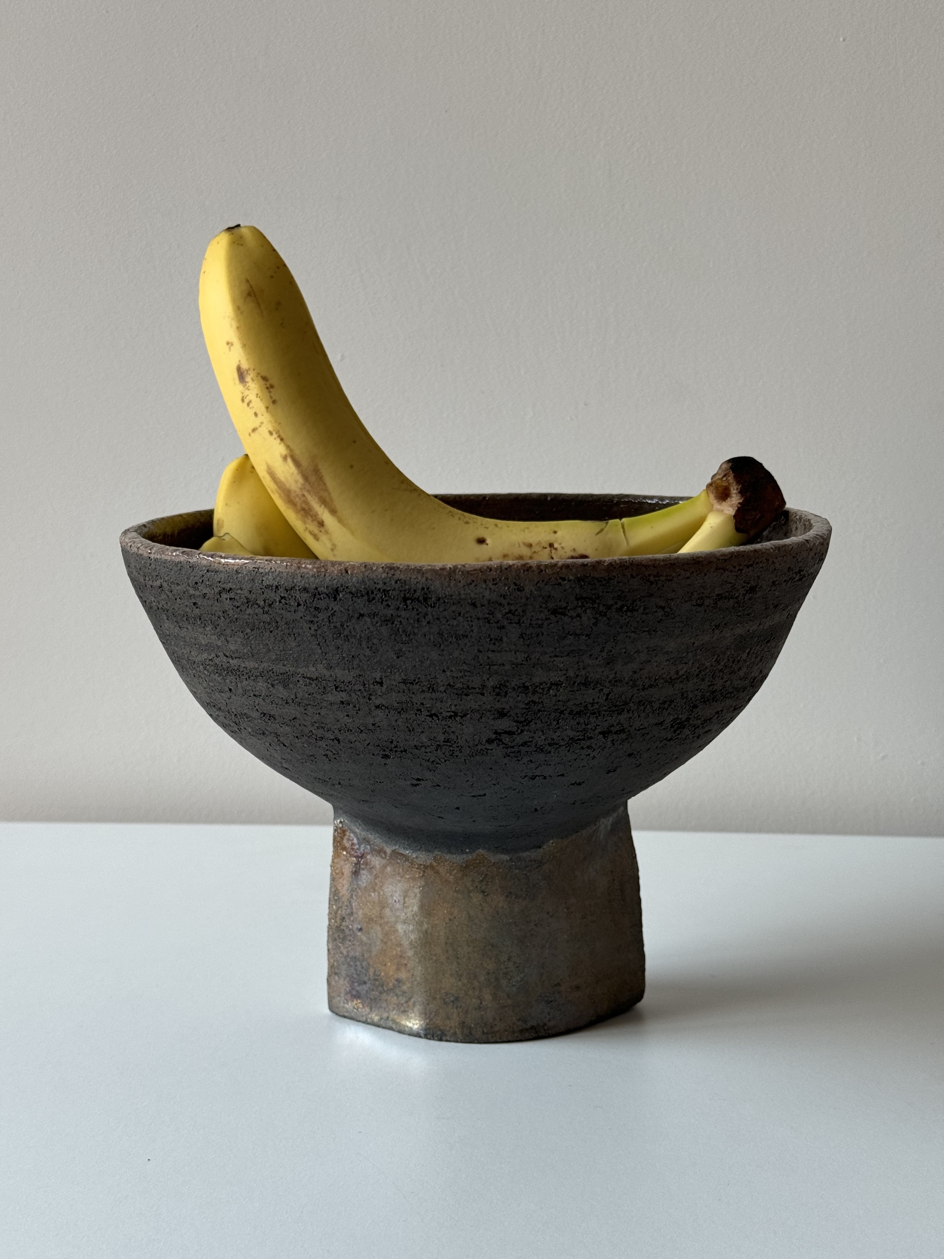 Handmade ceramic dish for fruits with a signature