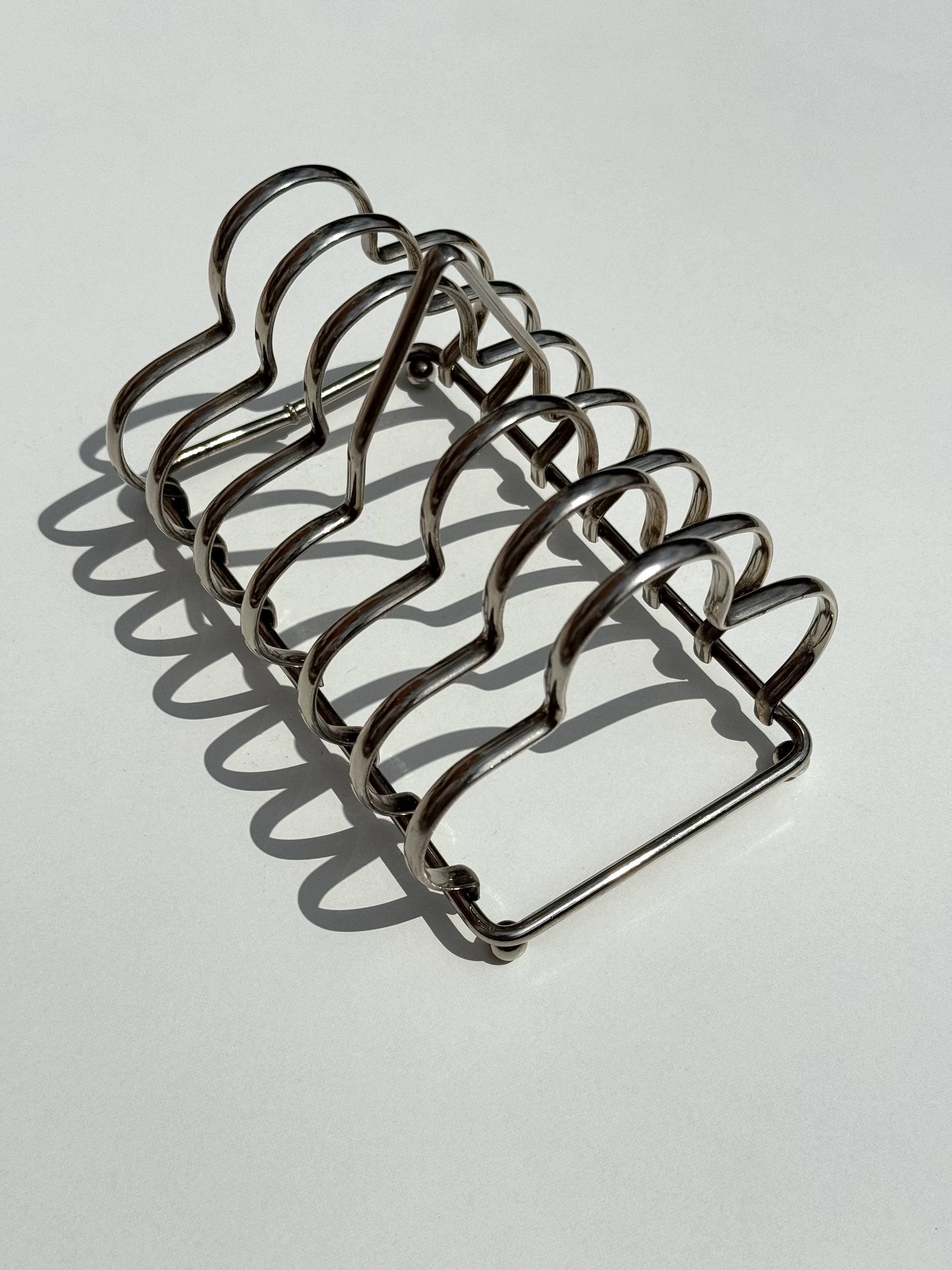 Toast Rack, made in England, silver-plated metal, holds 6 slices of bread