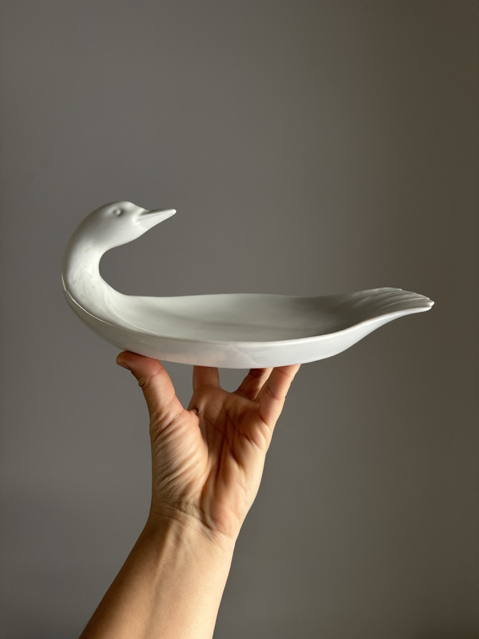Porcelain serving plate in the shape of a duck / France