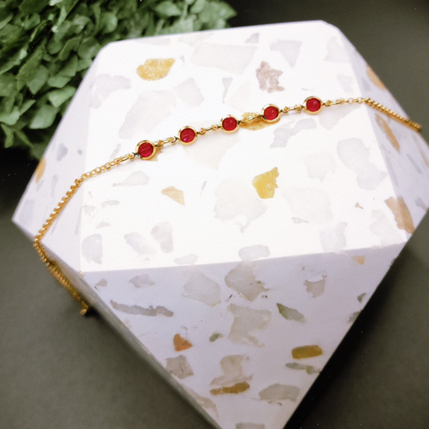 Gold Bracelet with Red Stones
