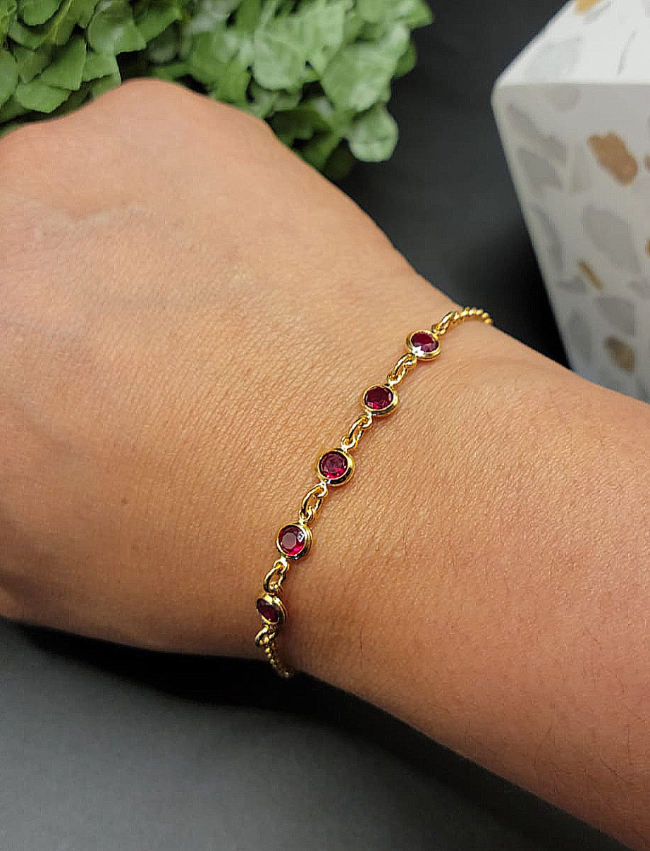 Gold Bracelet with Red Stones