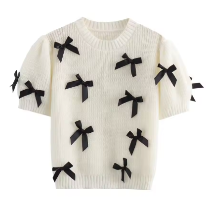 Cream Sweater with Black Bows