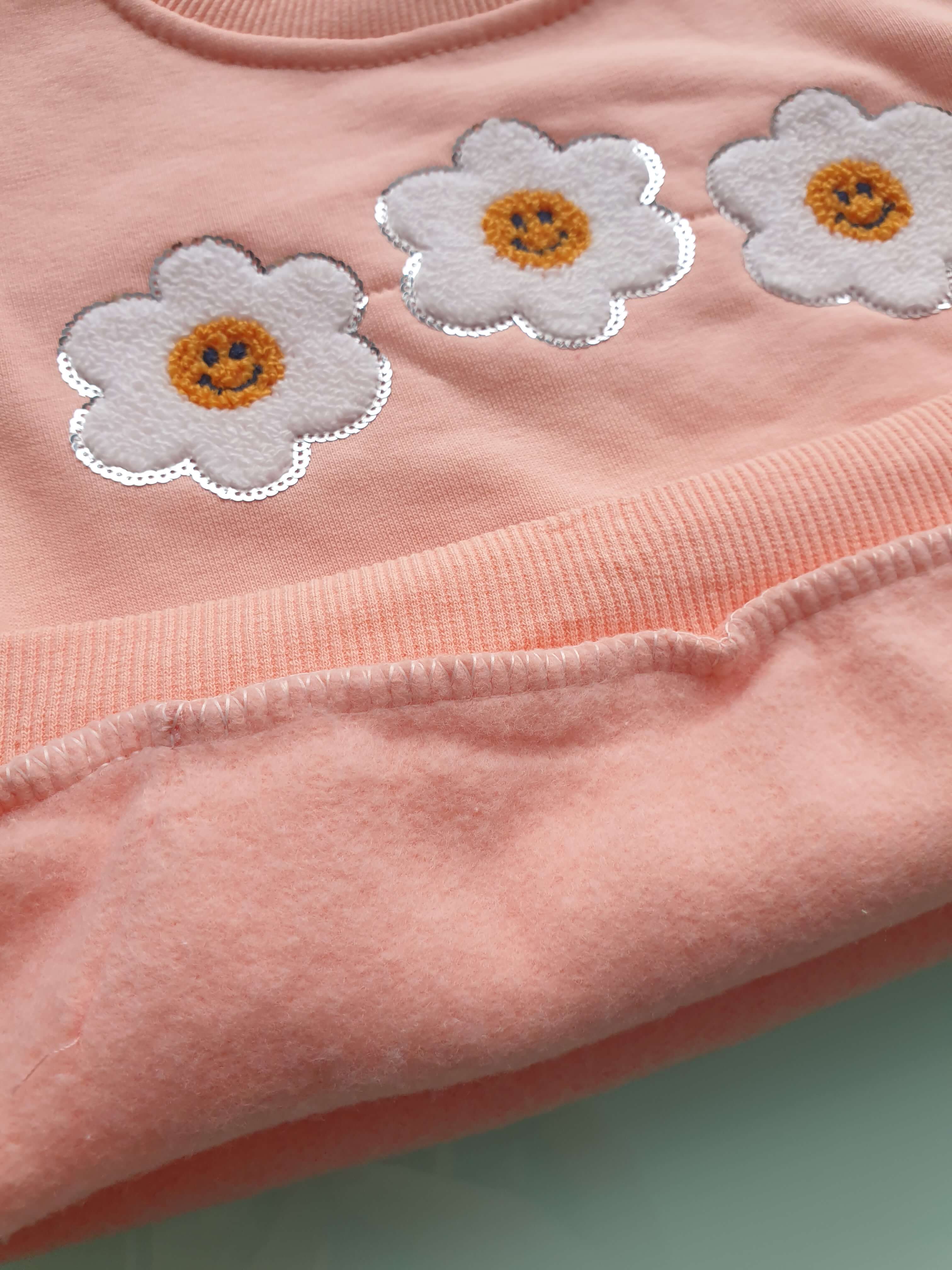 Pašiltintas kūdikių kostiumėlis