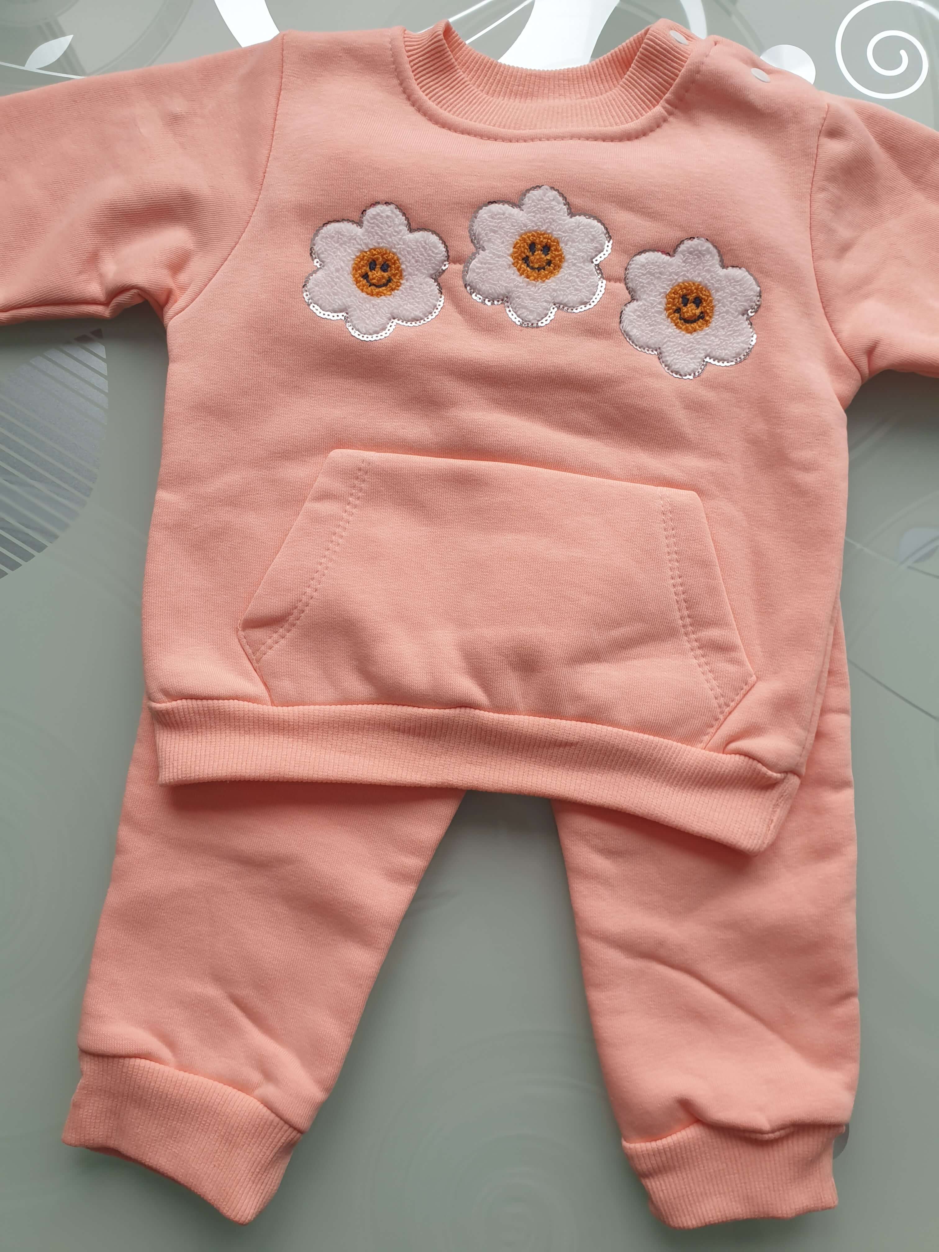 Pašiltintas kūdikių kostiumėlis