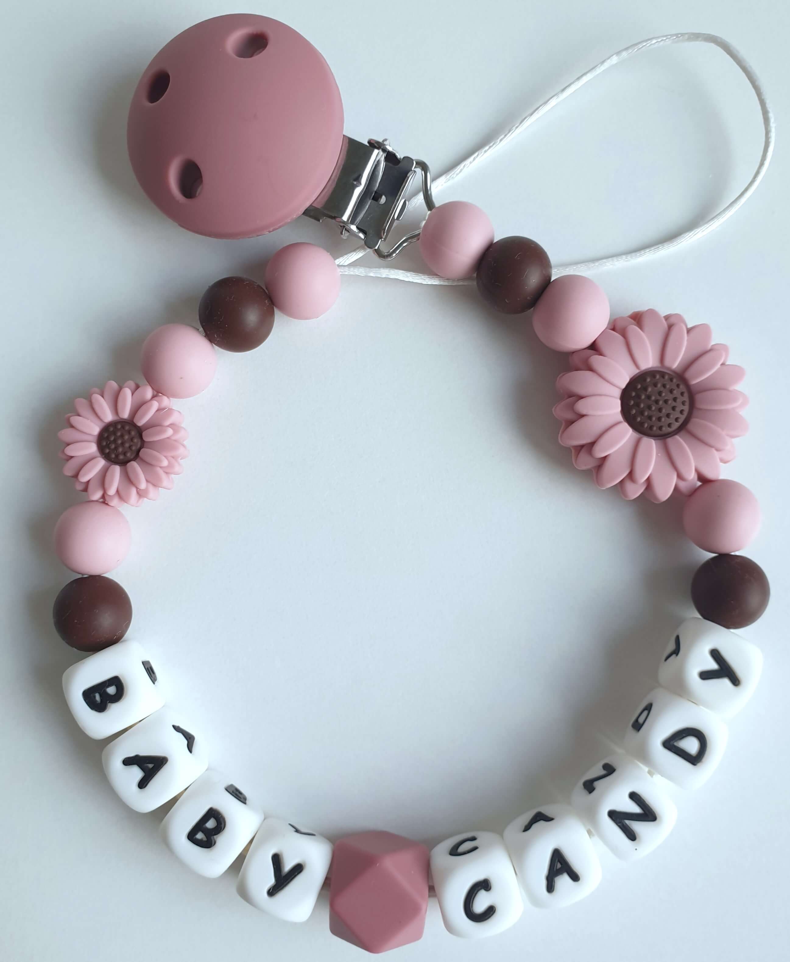 Vardinis čiulptuko laikiklis