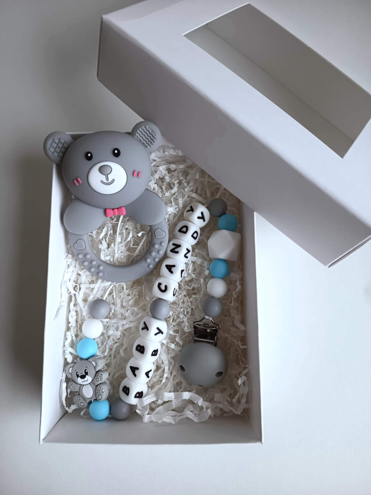 2 in 1 kramtukas/barškutis su laikikliu