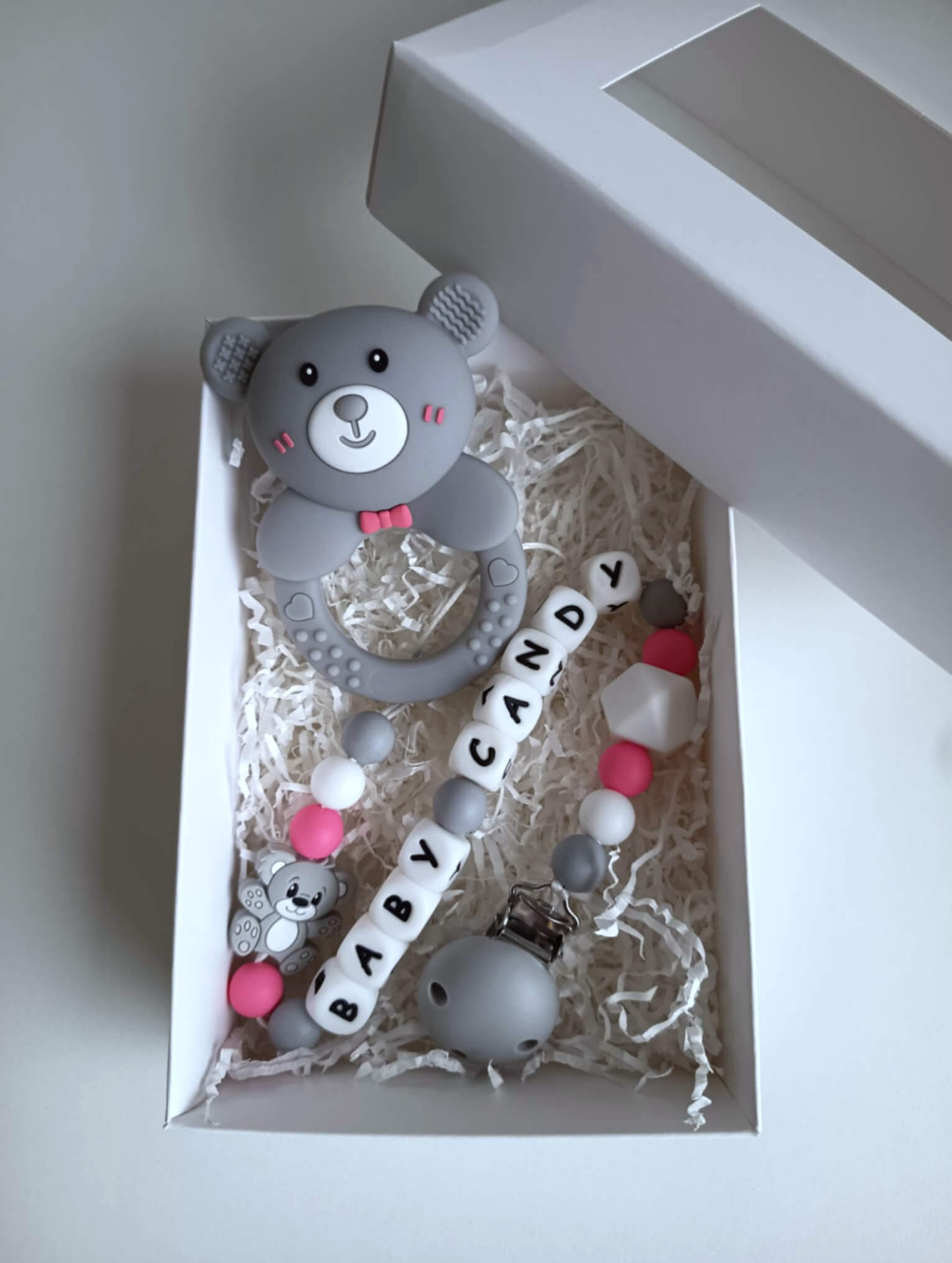 2 in 1 kramtukas/barškutis su laikikliu