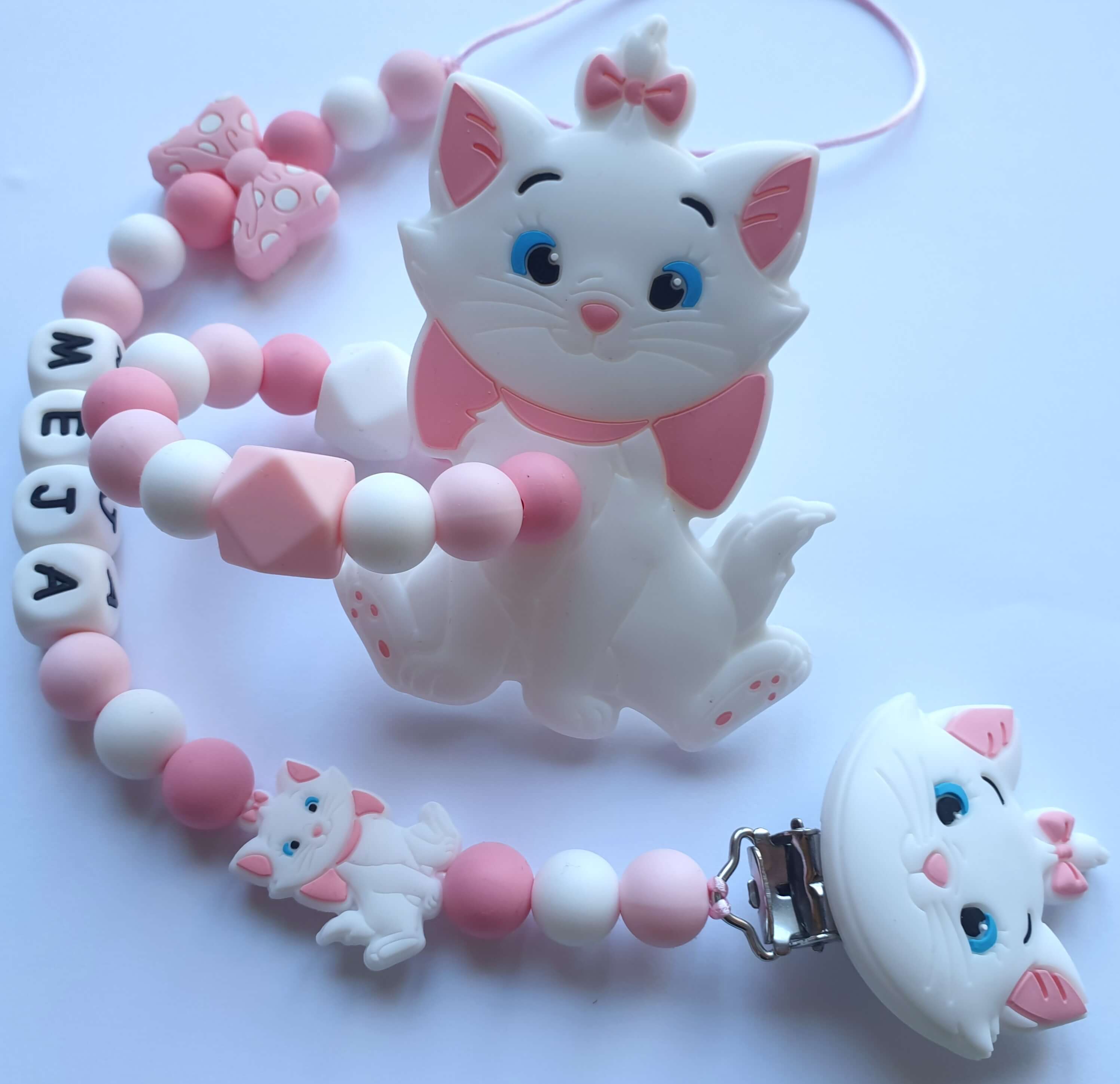 Komplektas iš čiulptuko laikiklio ir kramtuko su apyranke