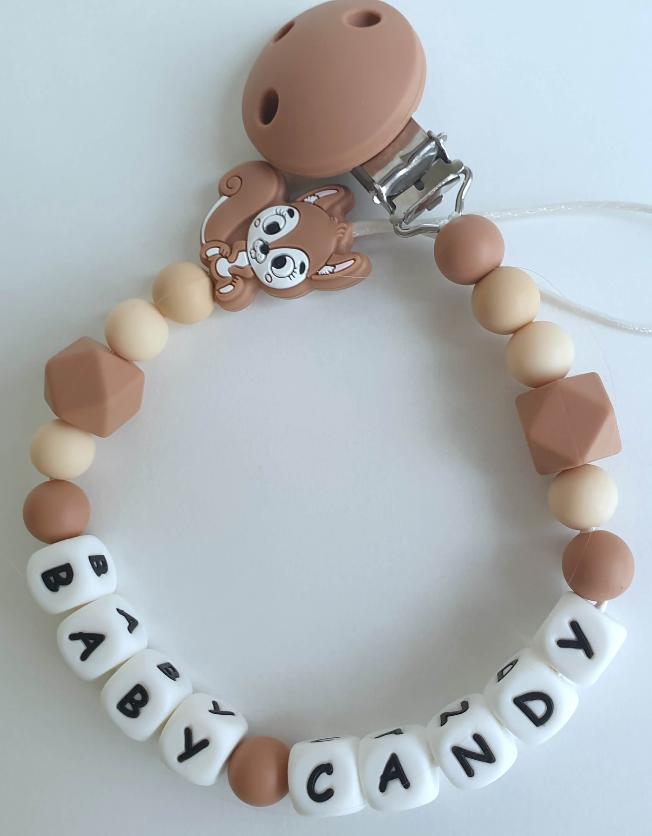 Vardinis čiulptuko laikiklis