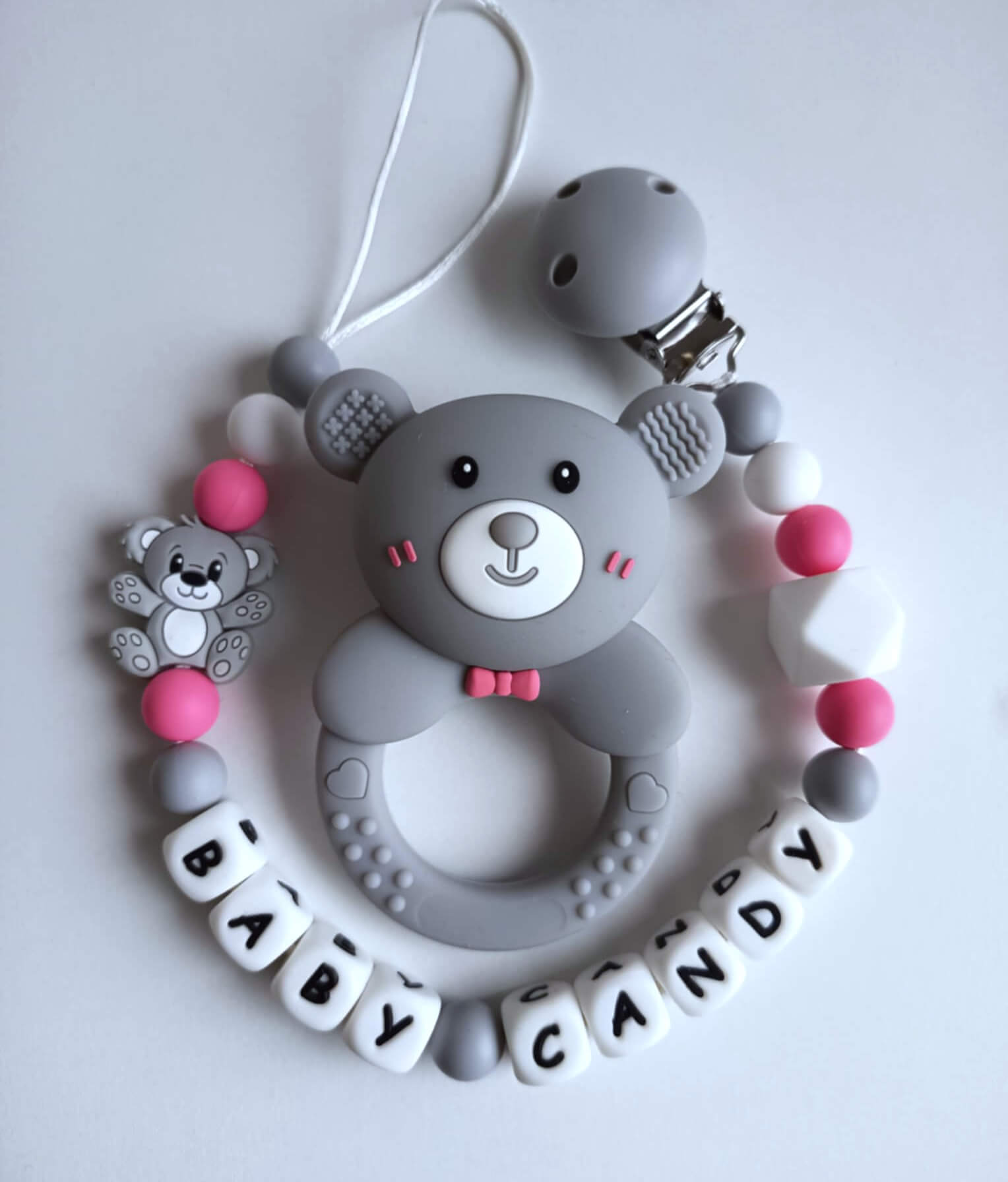 2 in 1 kramtukas/barškutis su laikikliu