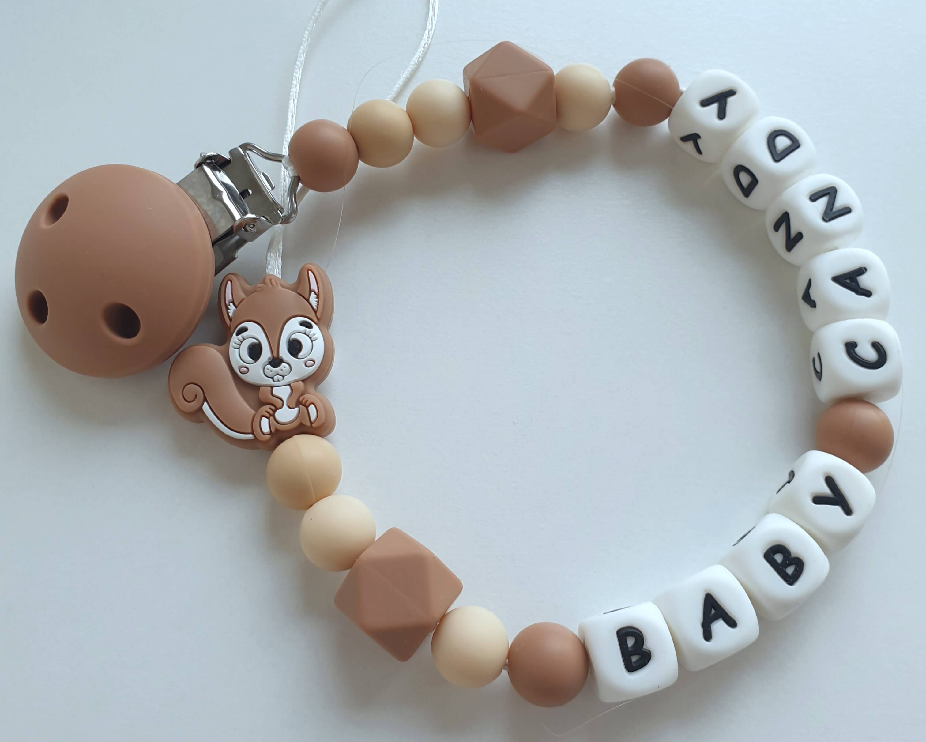 Vardinis čiulptuko laikiklis