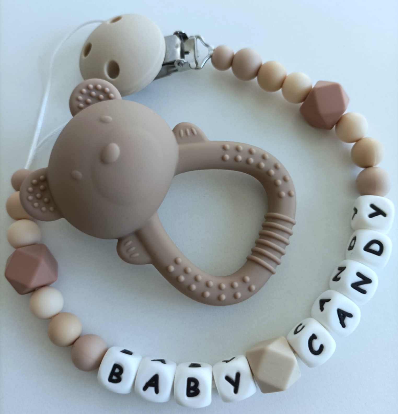 2 in 1 kramtukas/barškutis su laikikliu